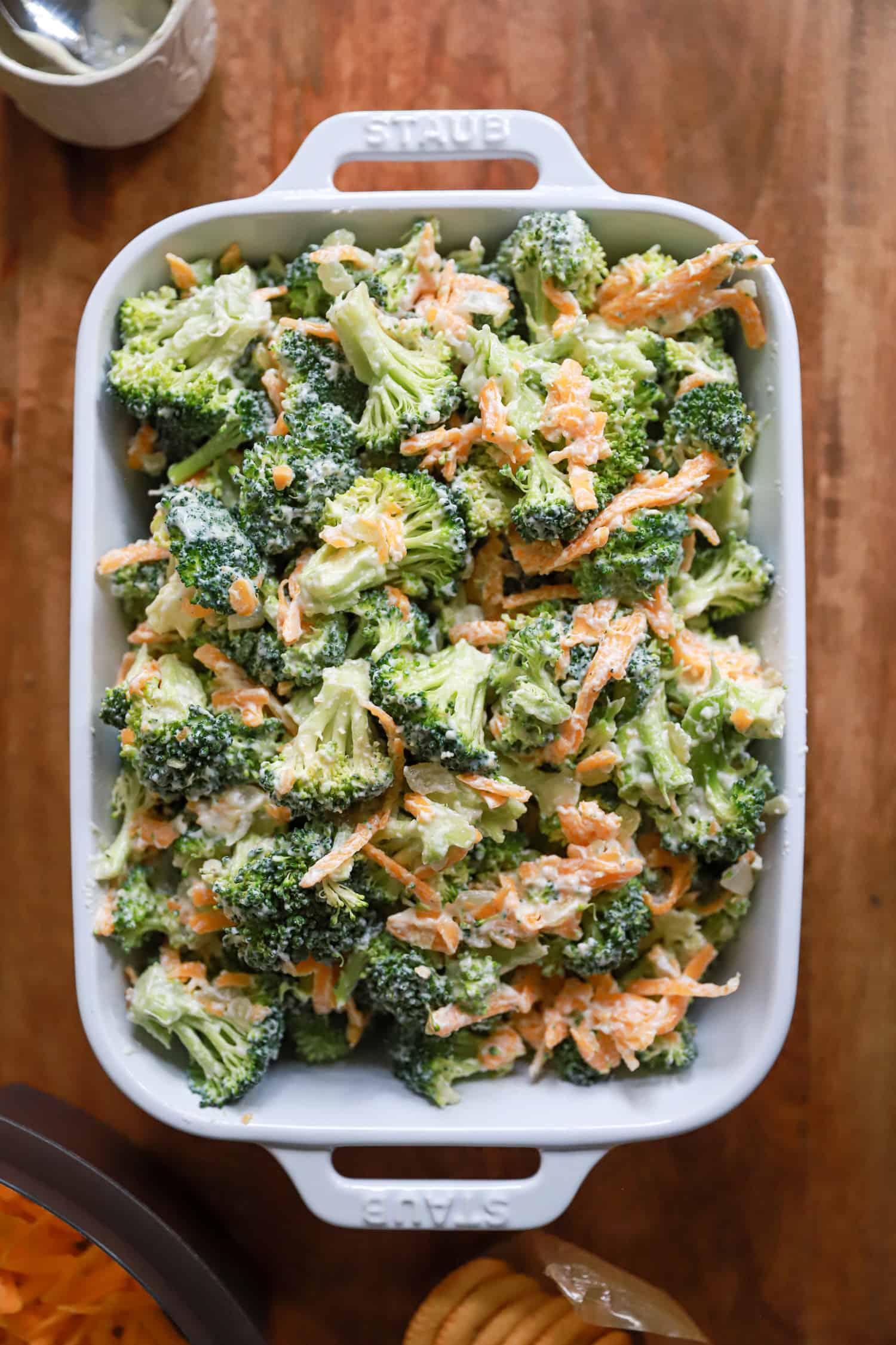 raw broccoli in a casserole dish before baking.