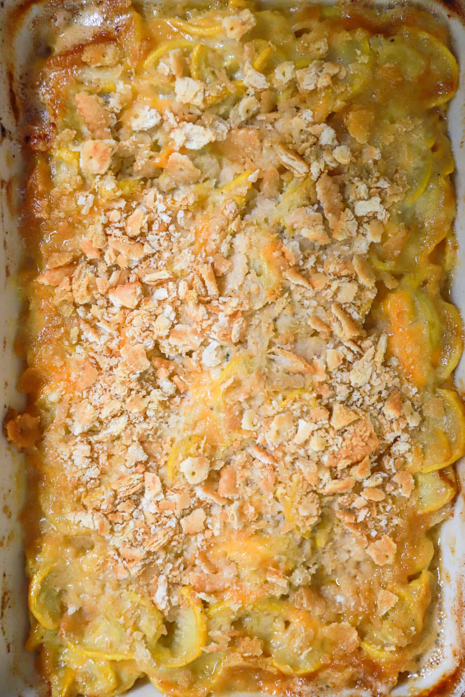 Top view close up of summer squash casserole topped with Ritz.
