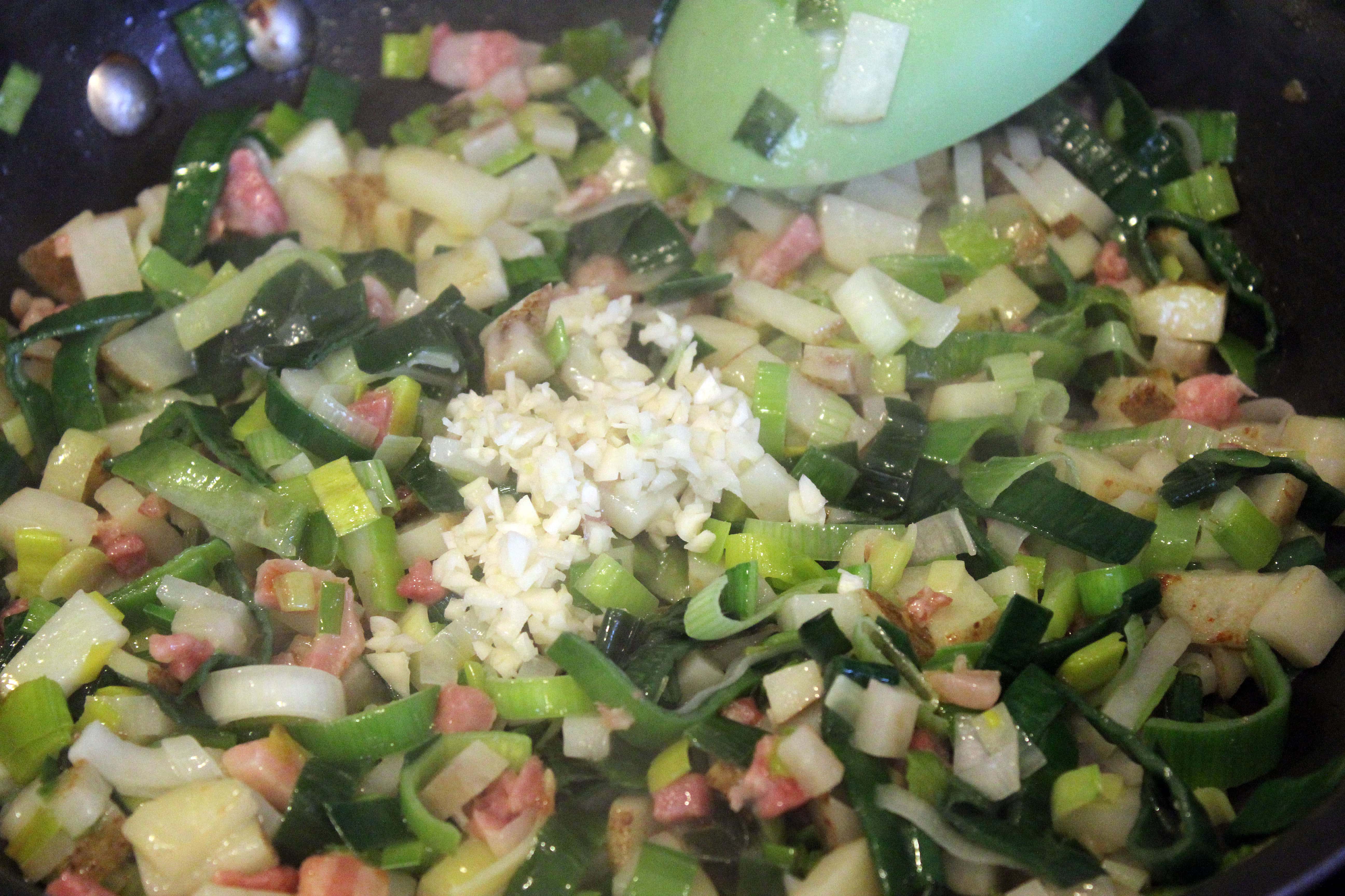 Add garlic to leek mixture