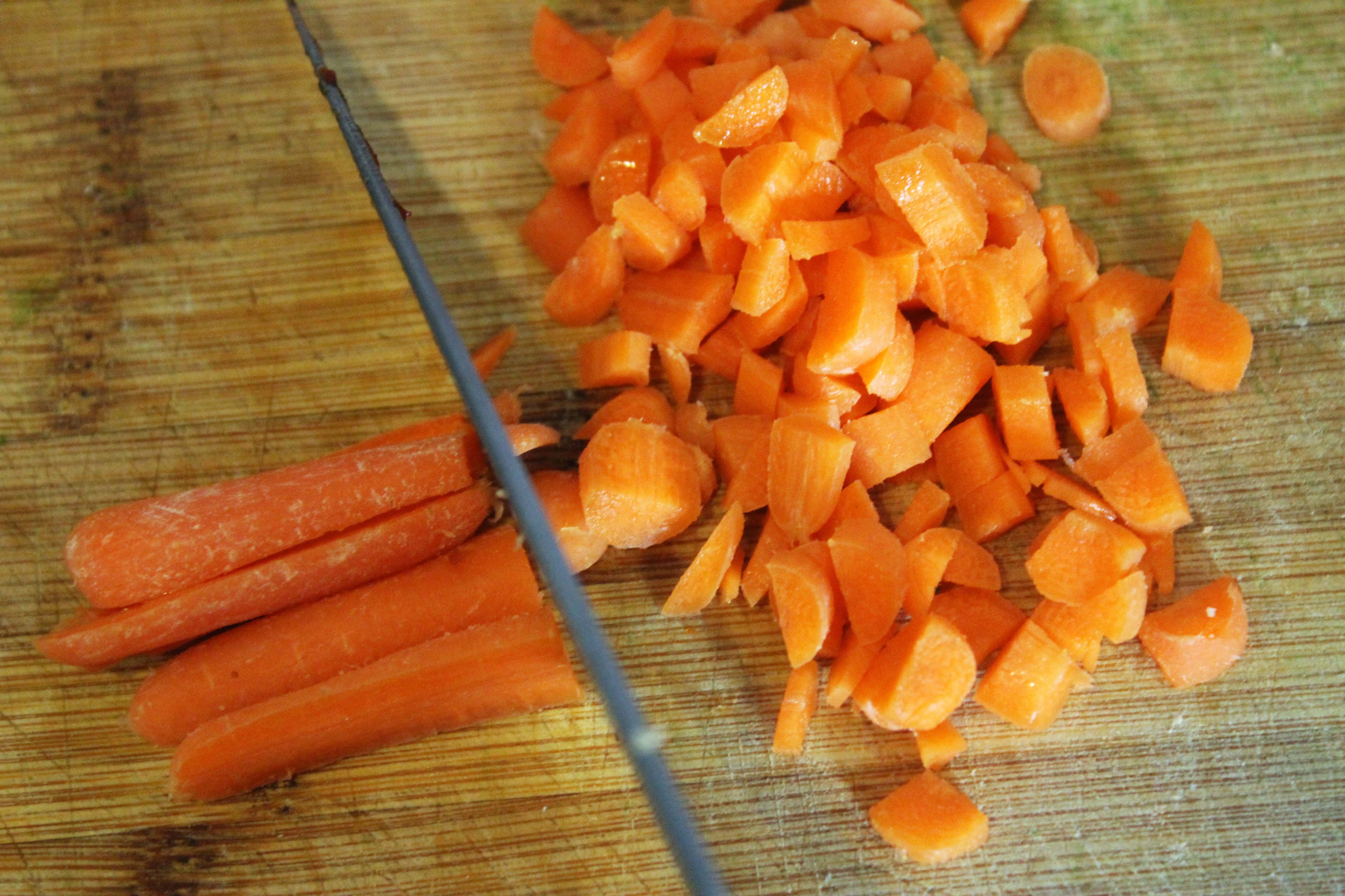 Cut carrot strips into small bits