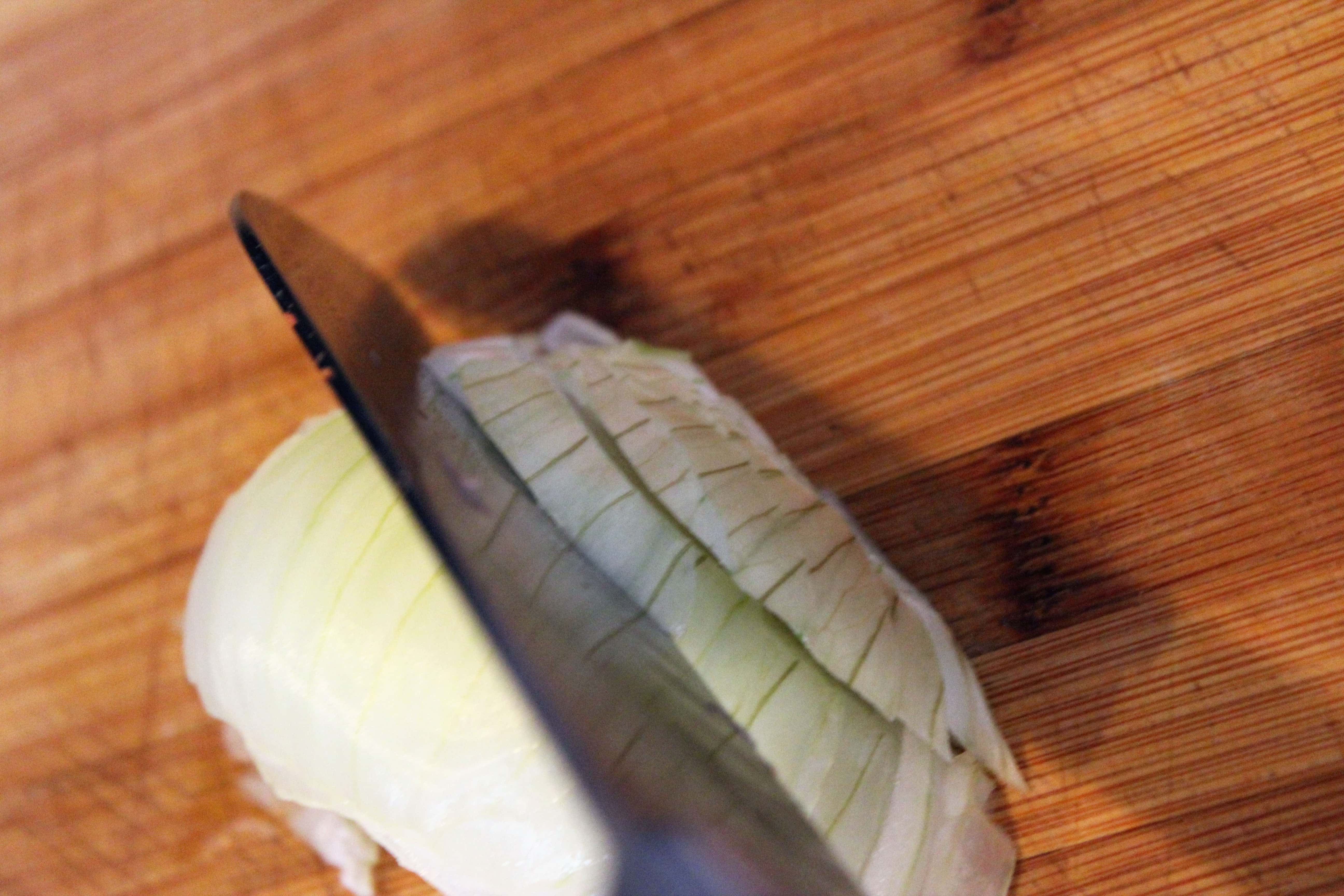 Cut onion planks into strips
