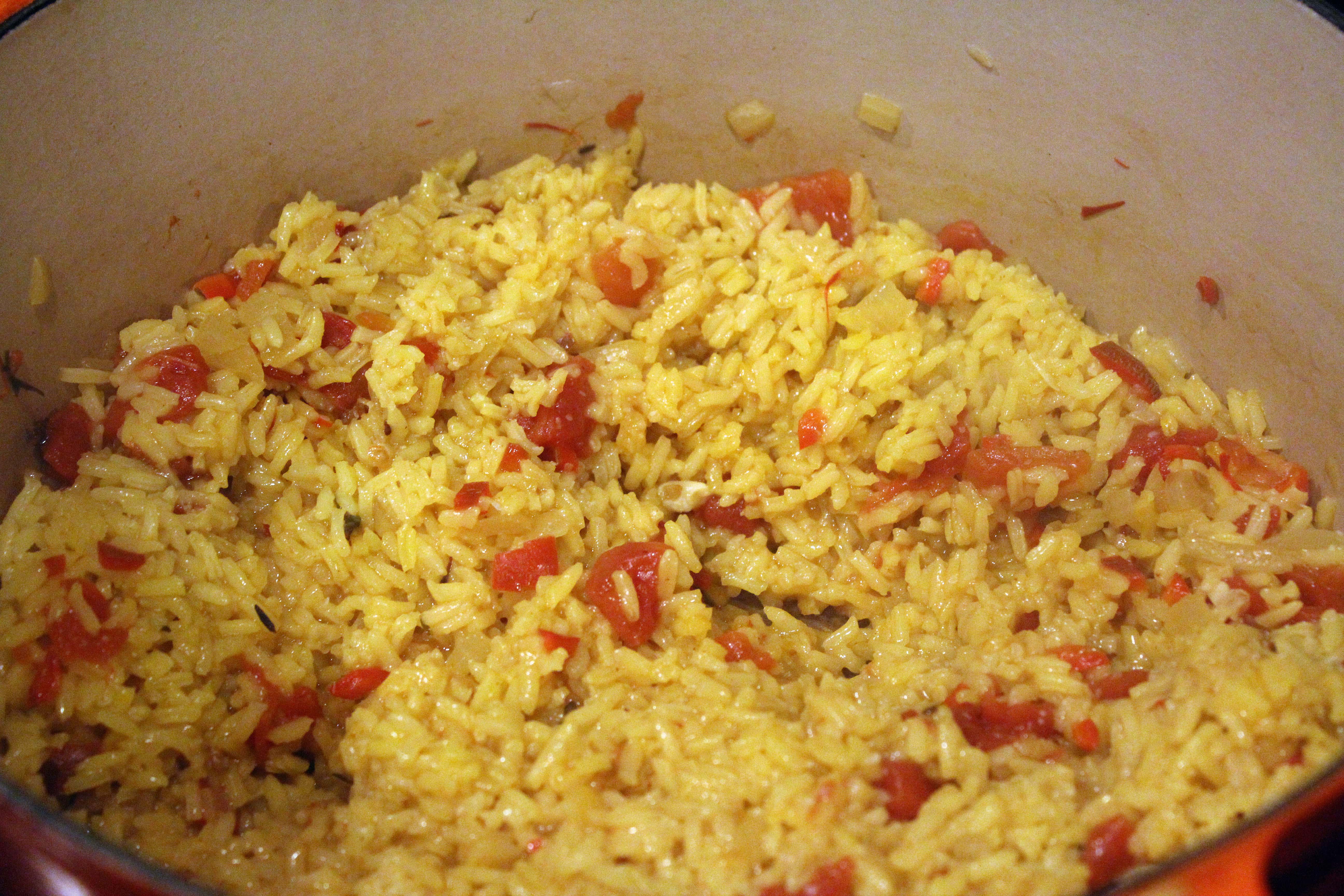 Partially cook rice