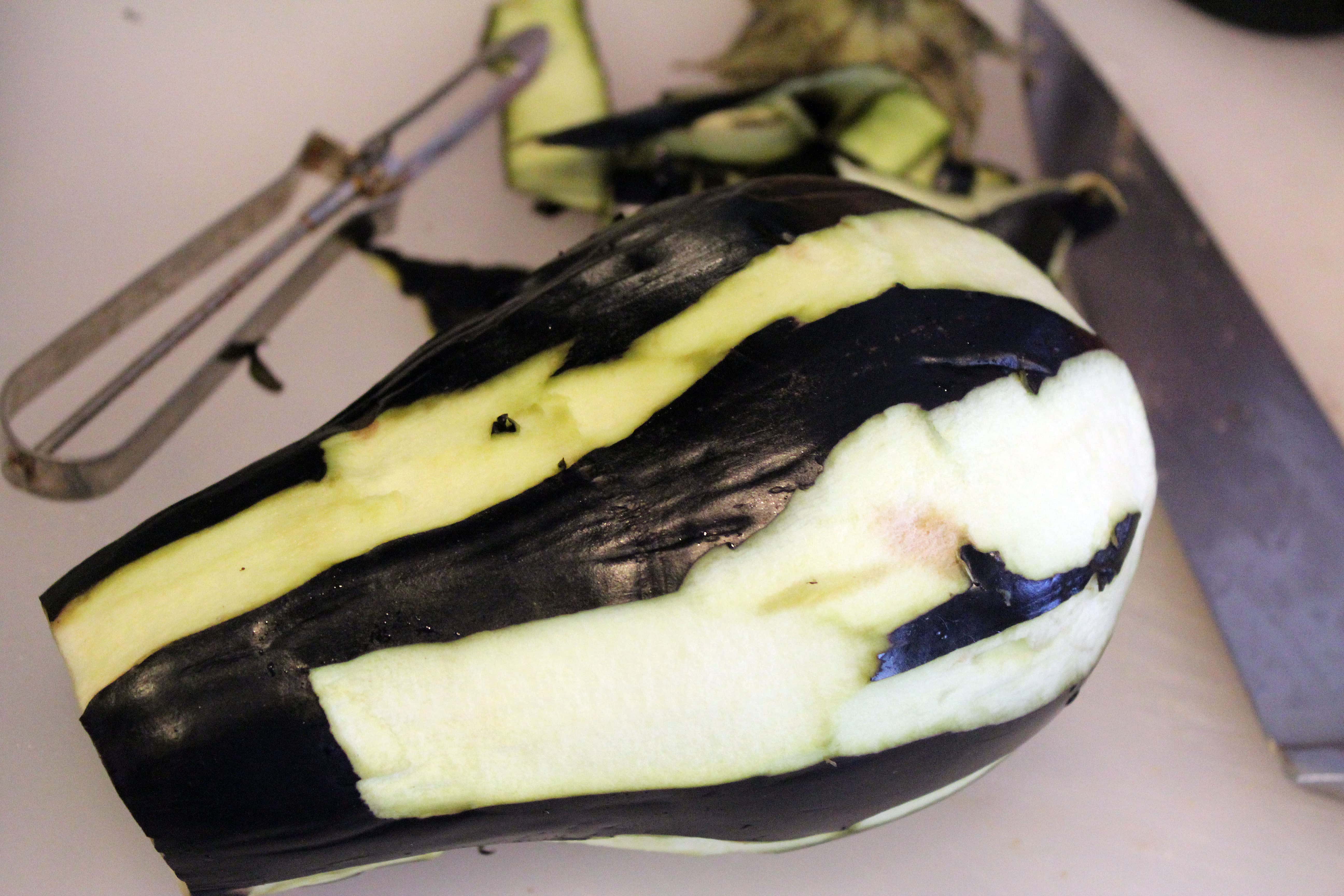 Partially peel eggplant