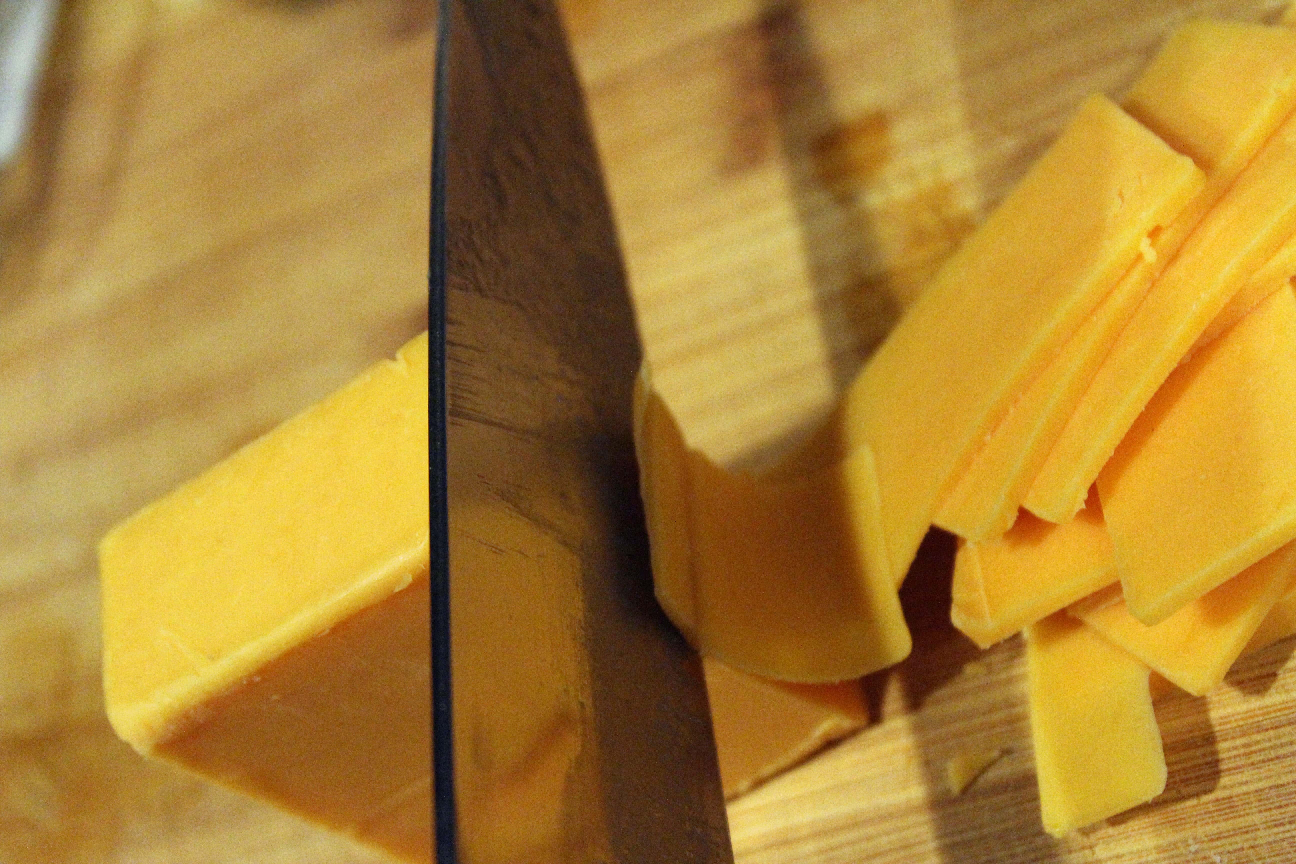Thinly slice cheese