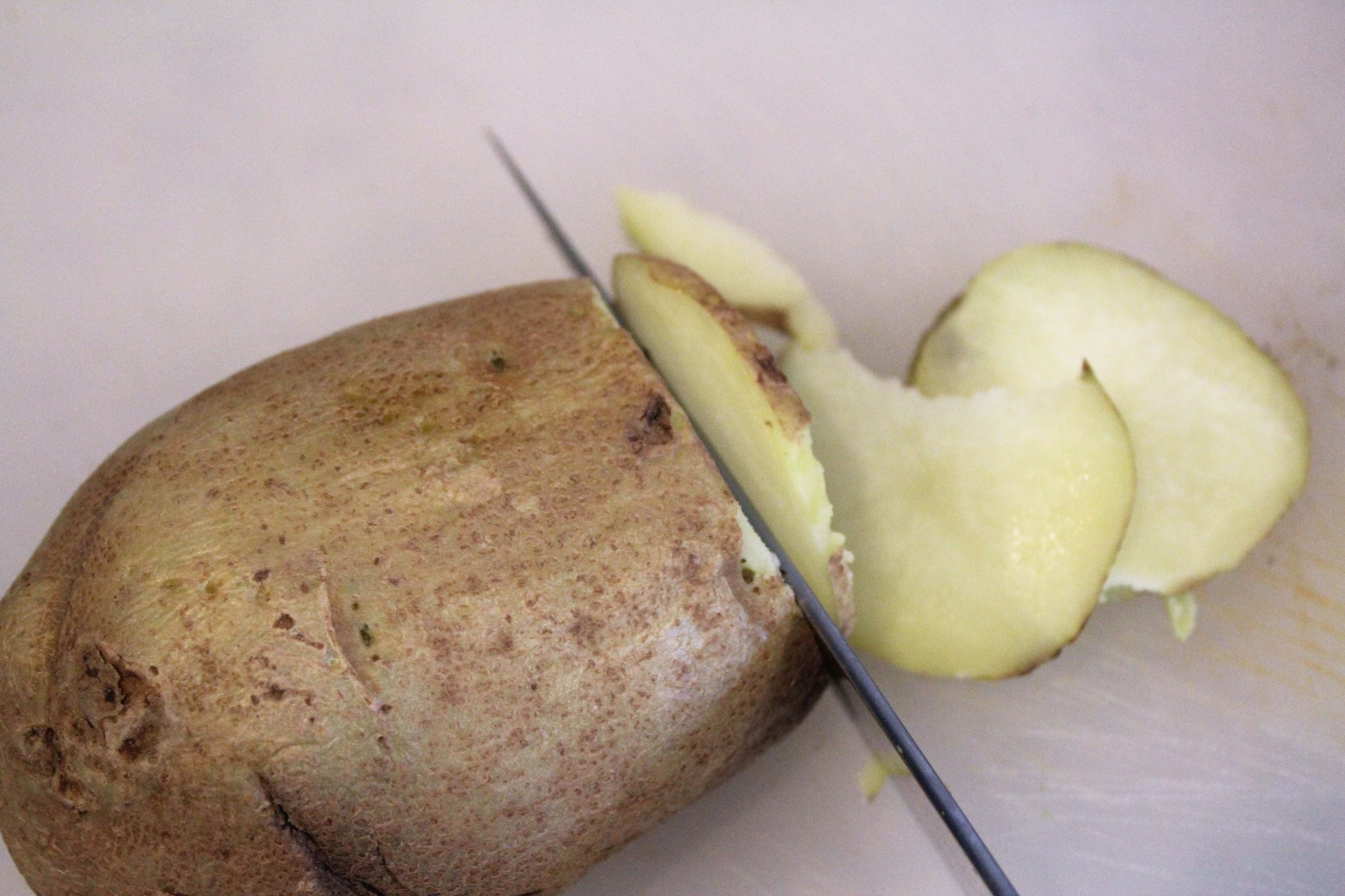 Thinly slice potato