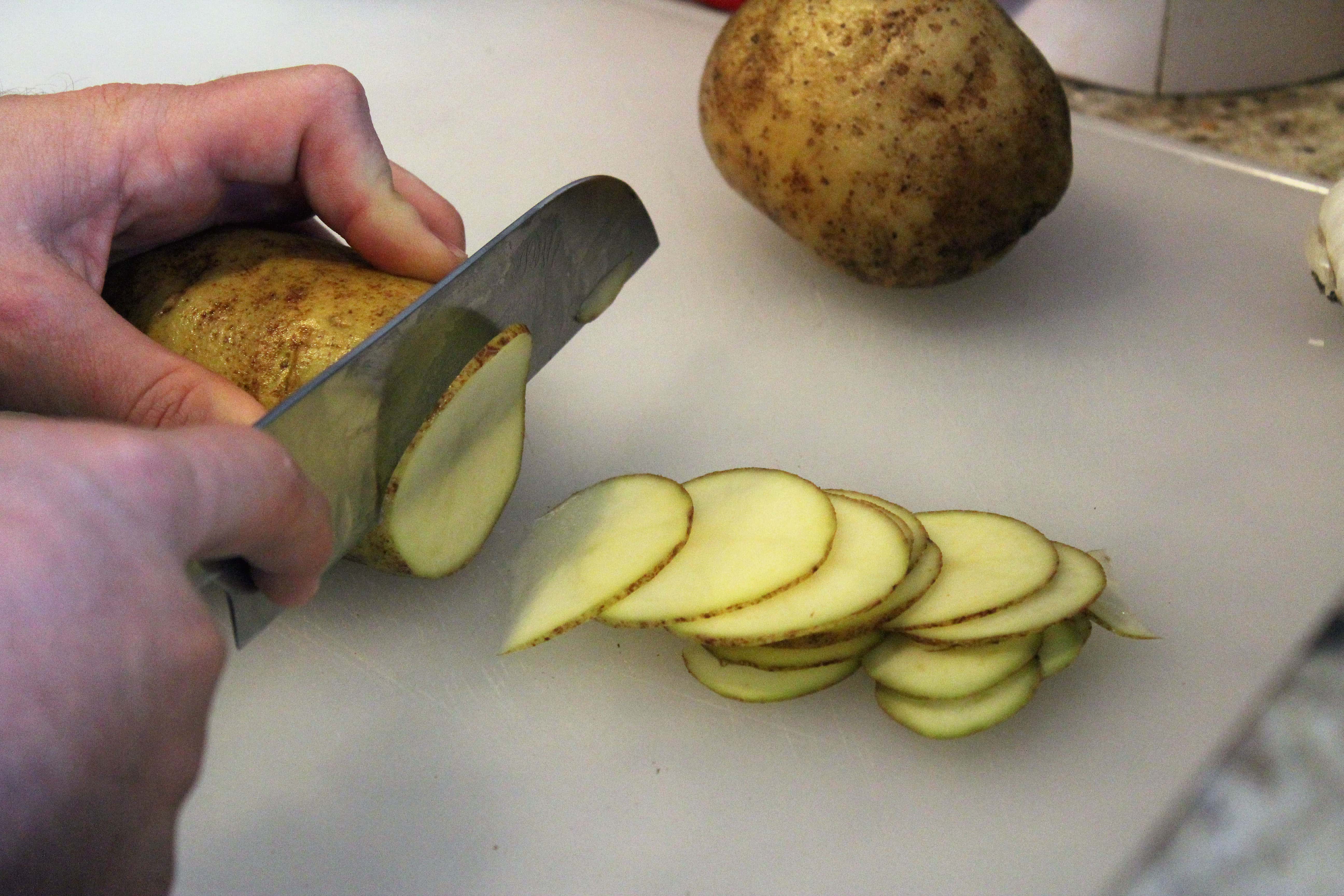 Thinly slice potato