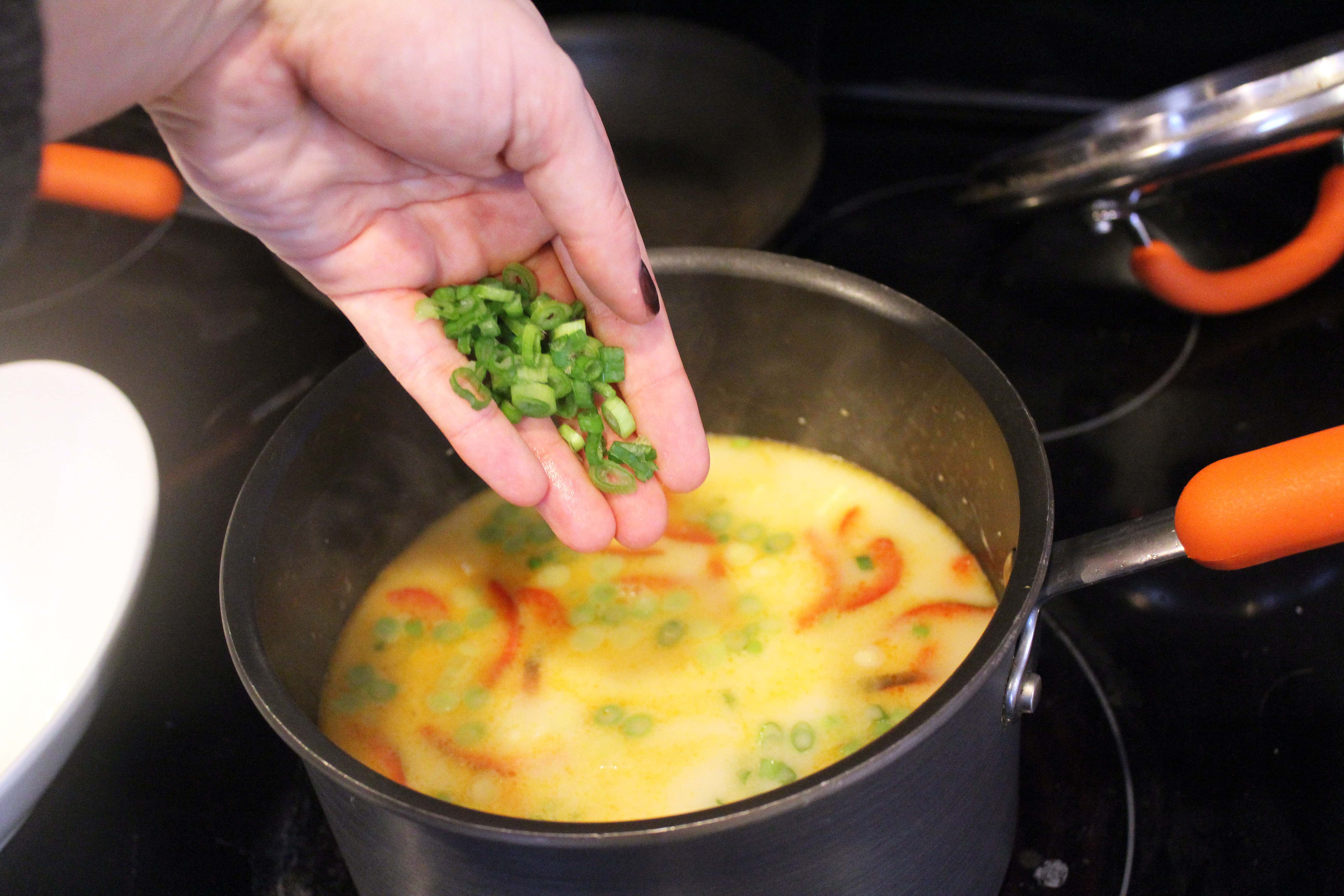 Add scallion greens to finished soup