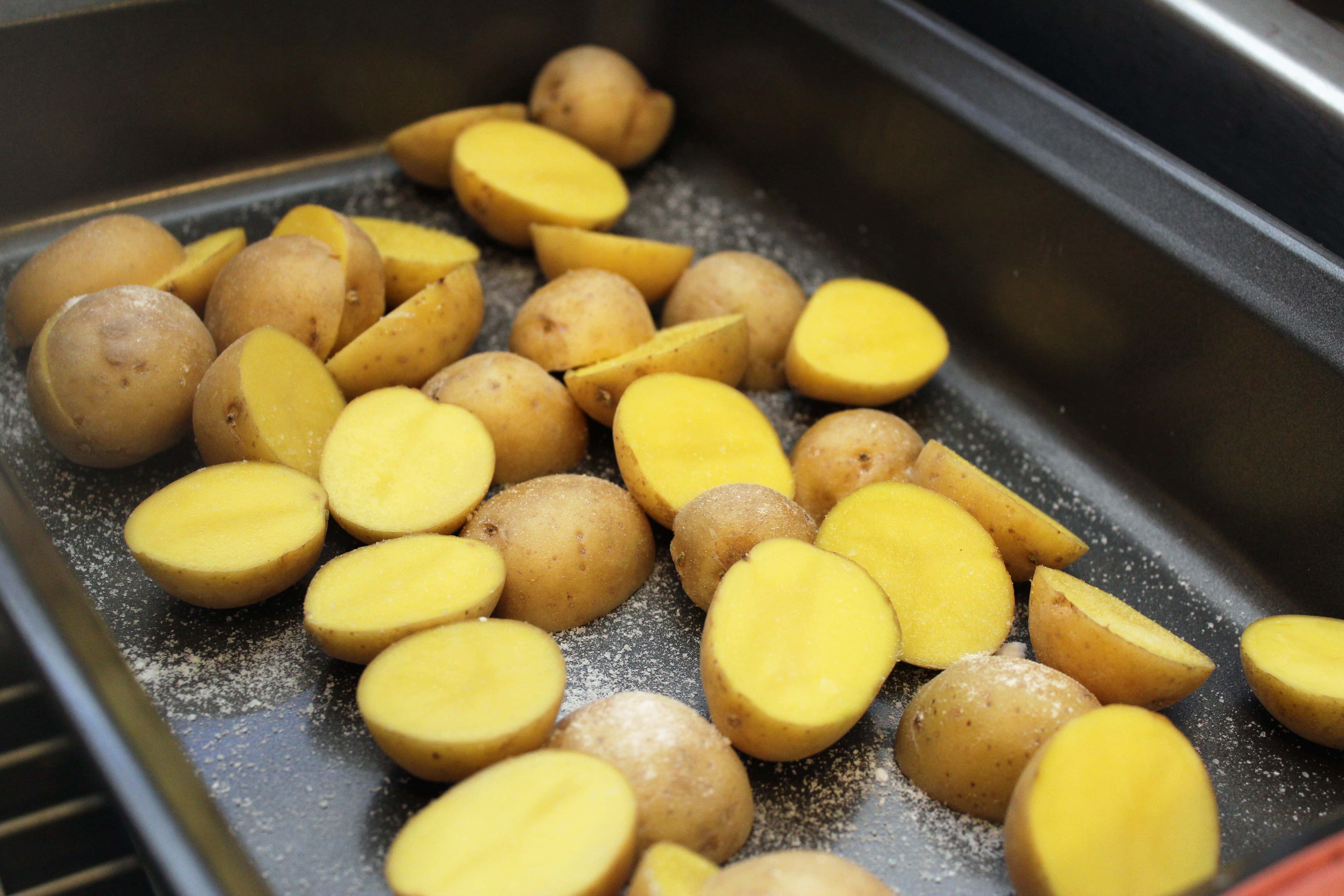 Arrange potatoes in pan with salt