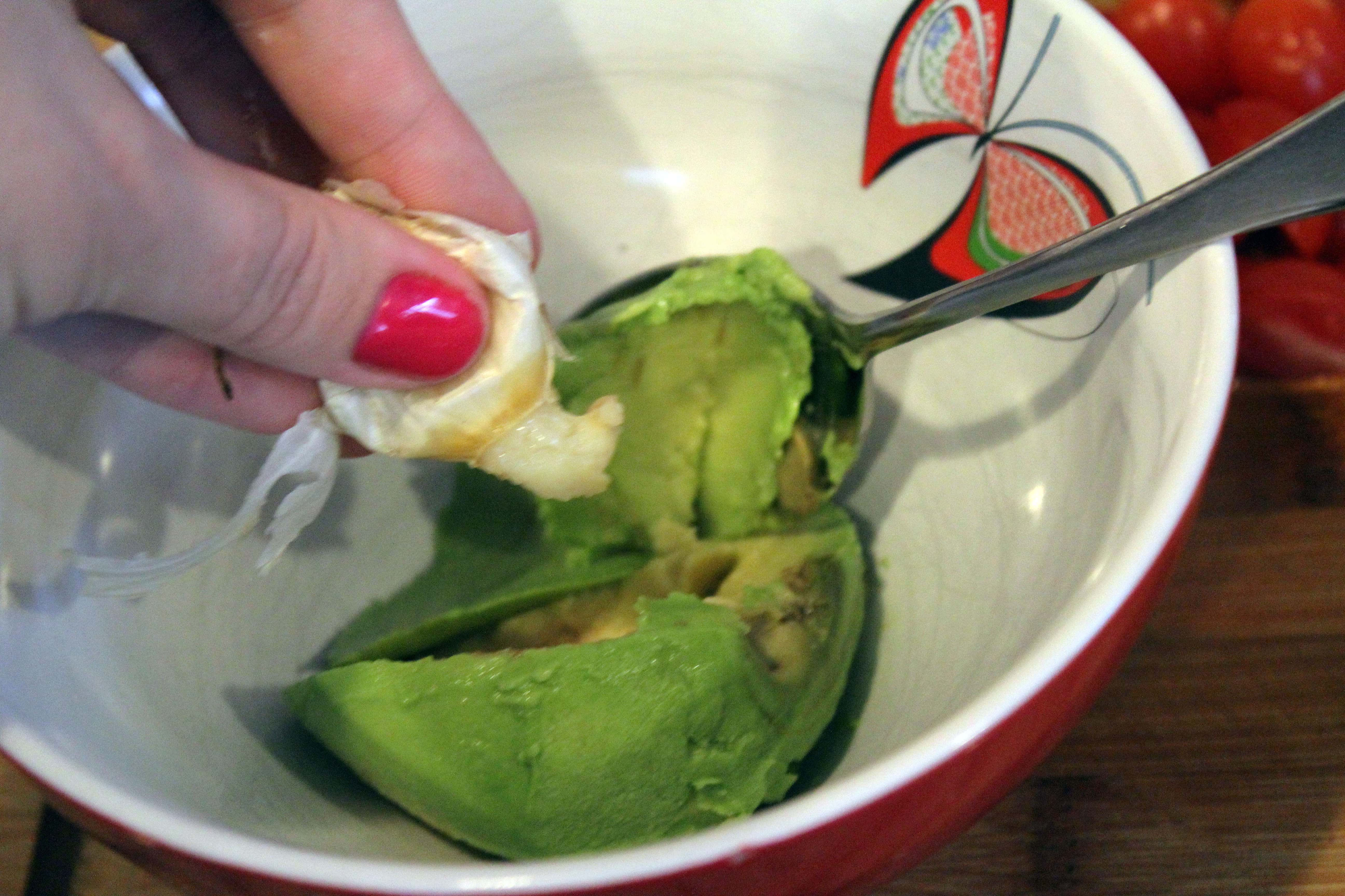 Squish garlic into avocado