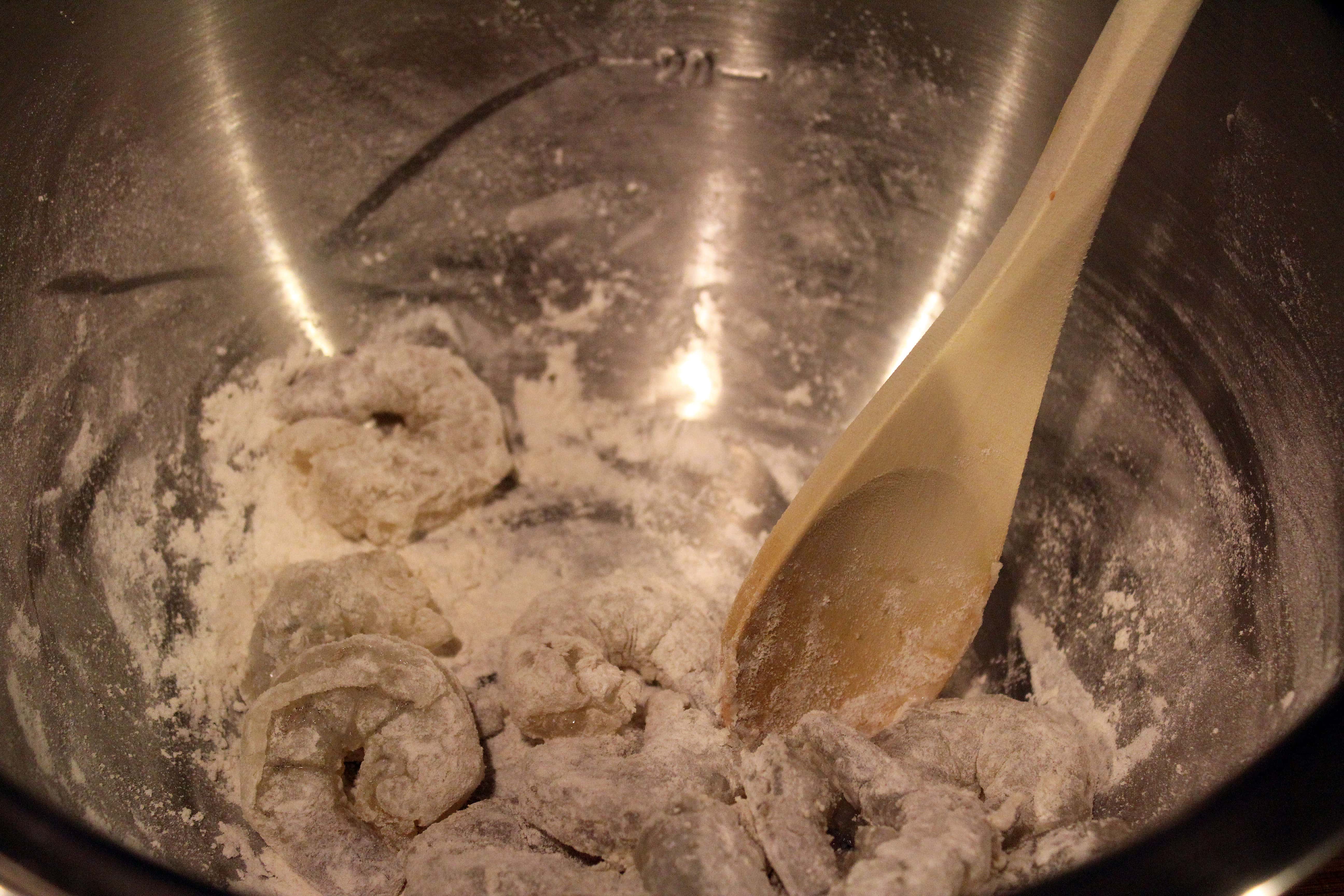 Stir flour into shrimp