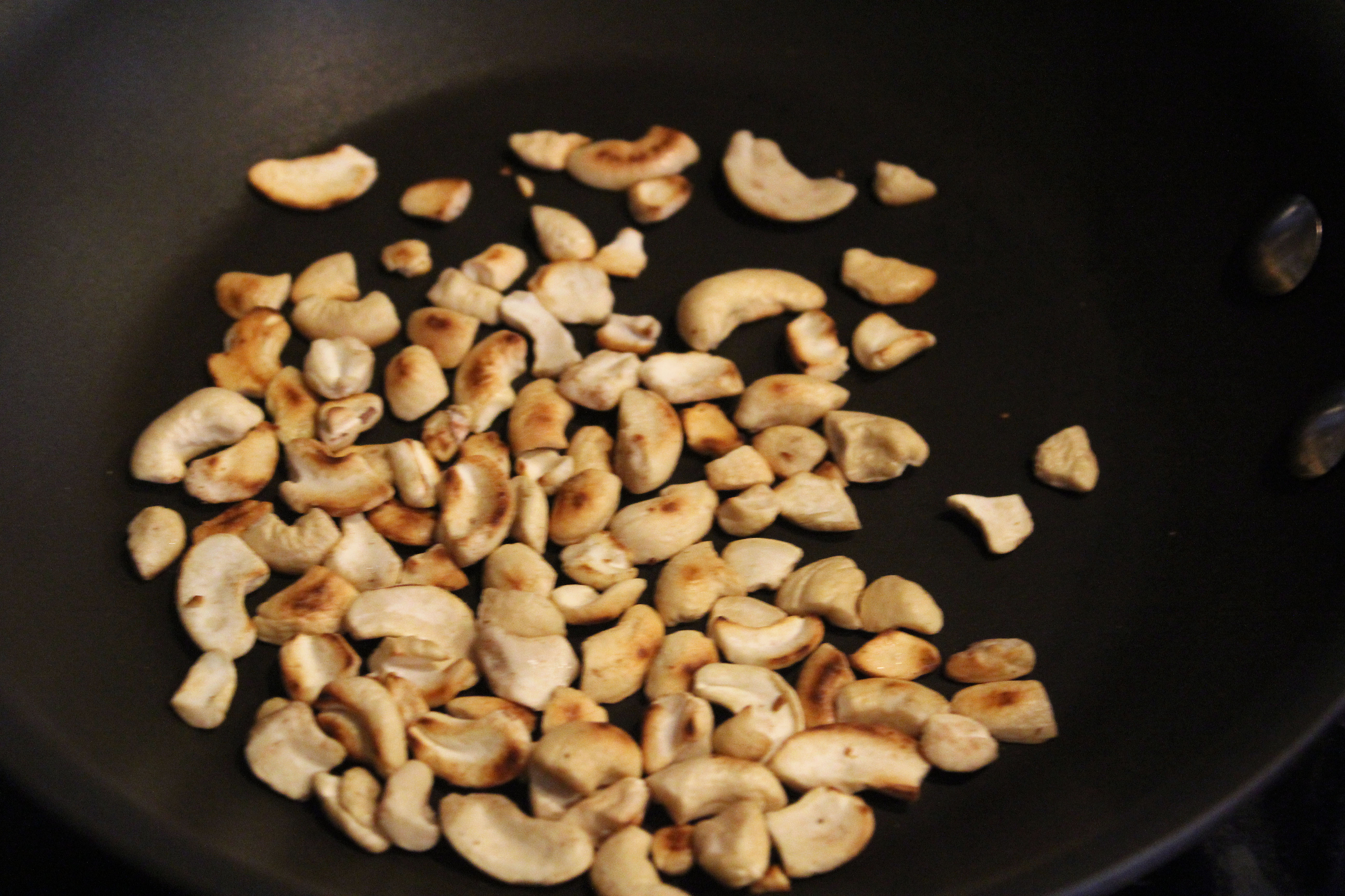 Toast cashews in dry skillet