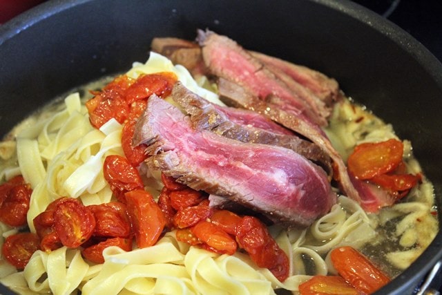 Add noodles with steak to sauce