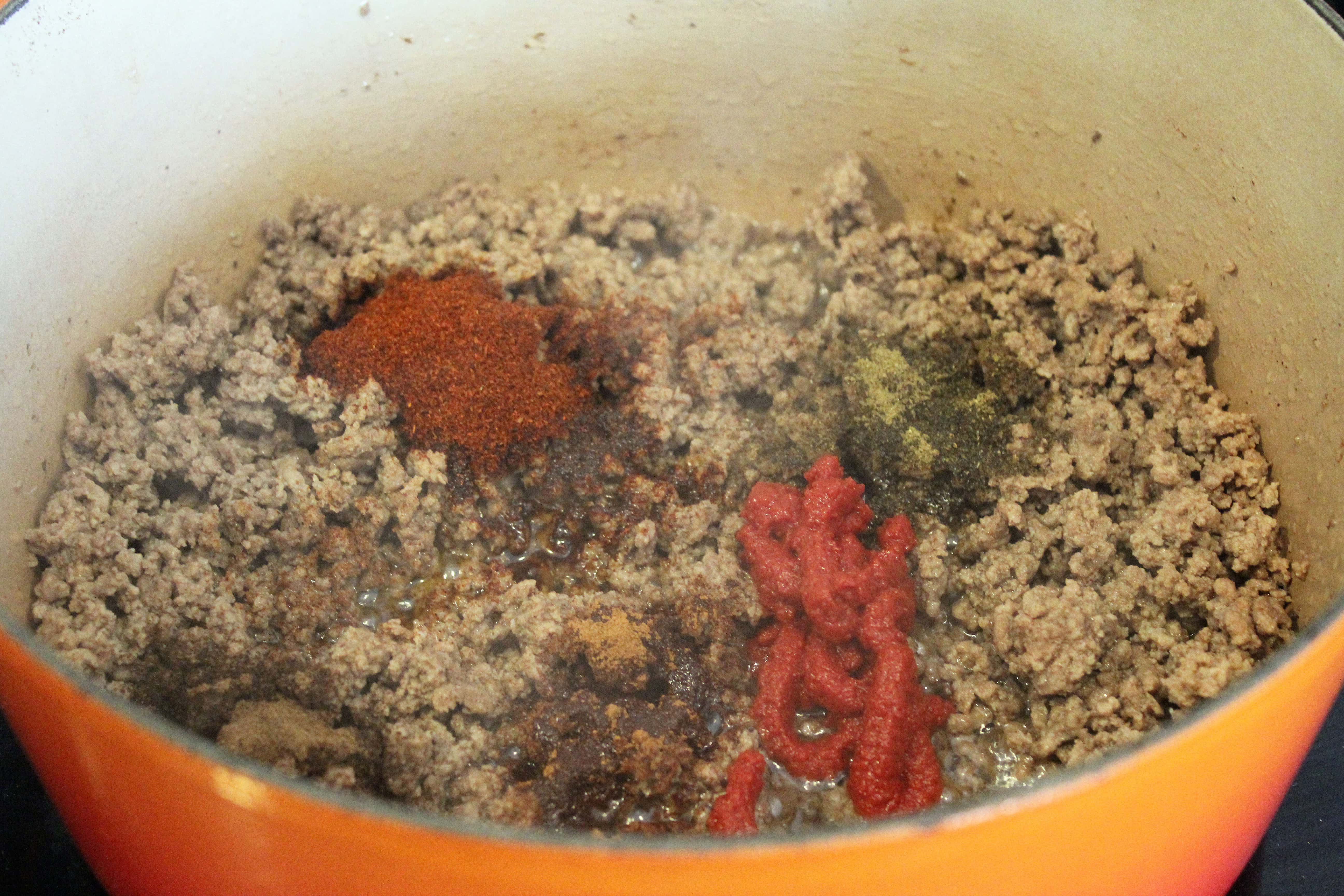 Add spices to pot