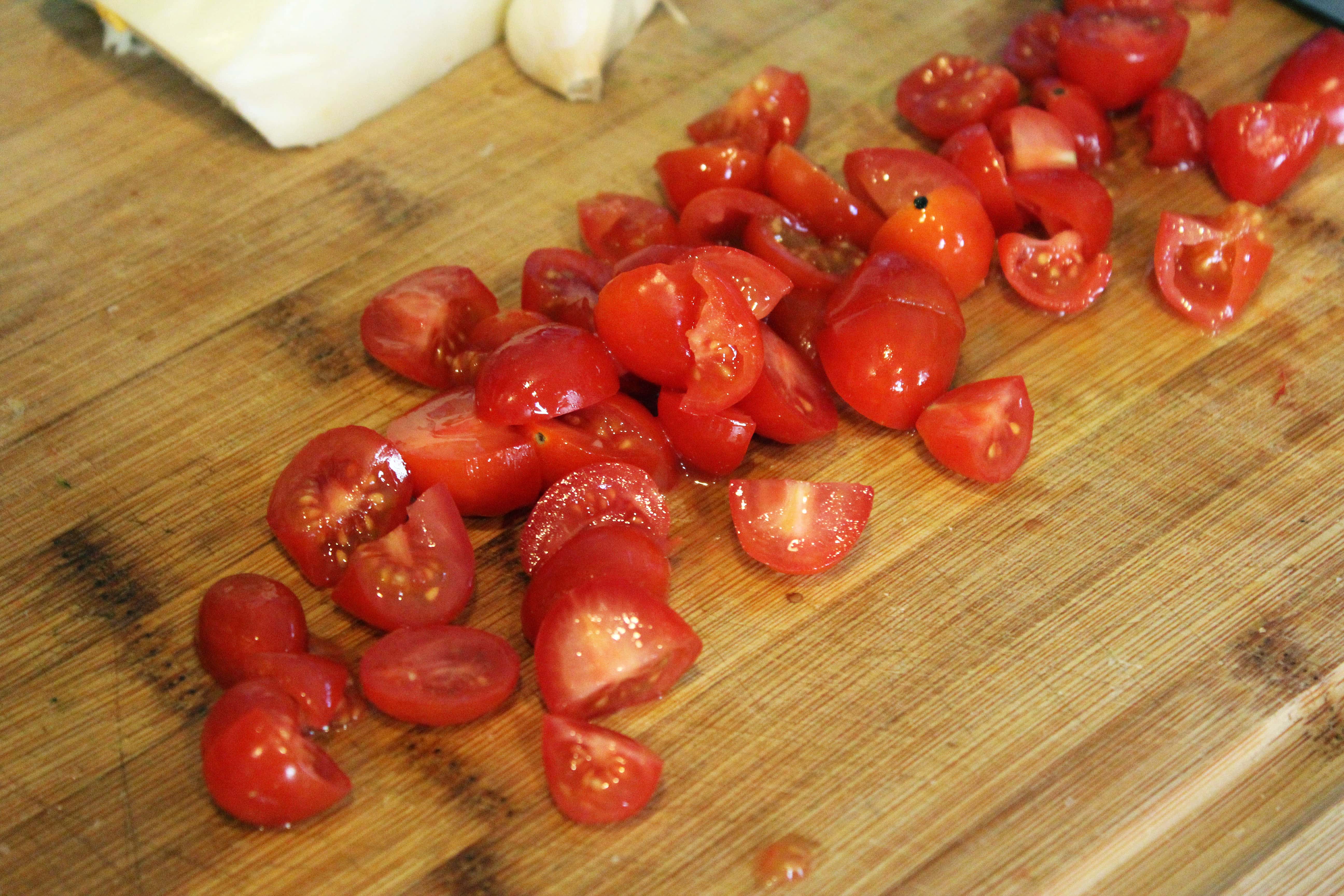 Halve or quarter tomatoes