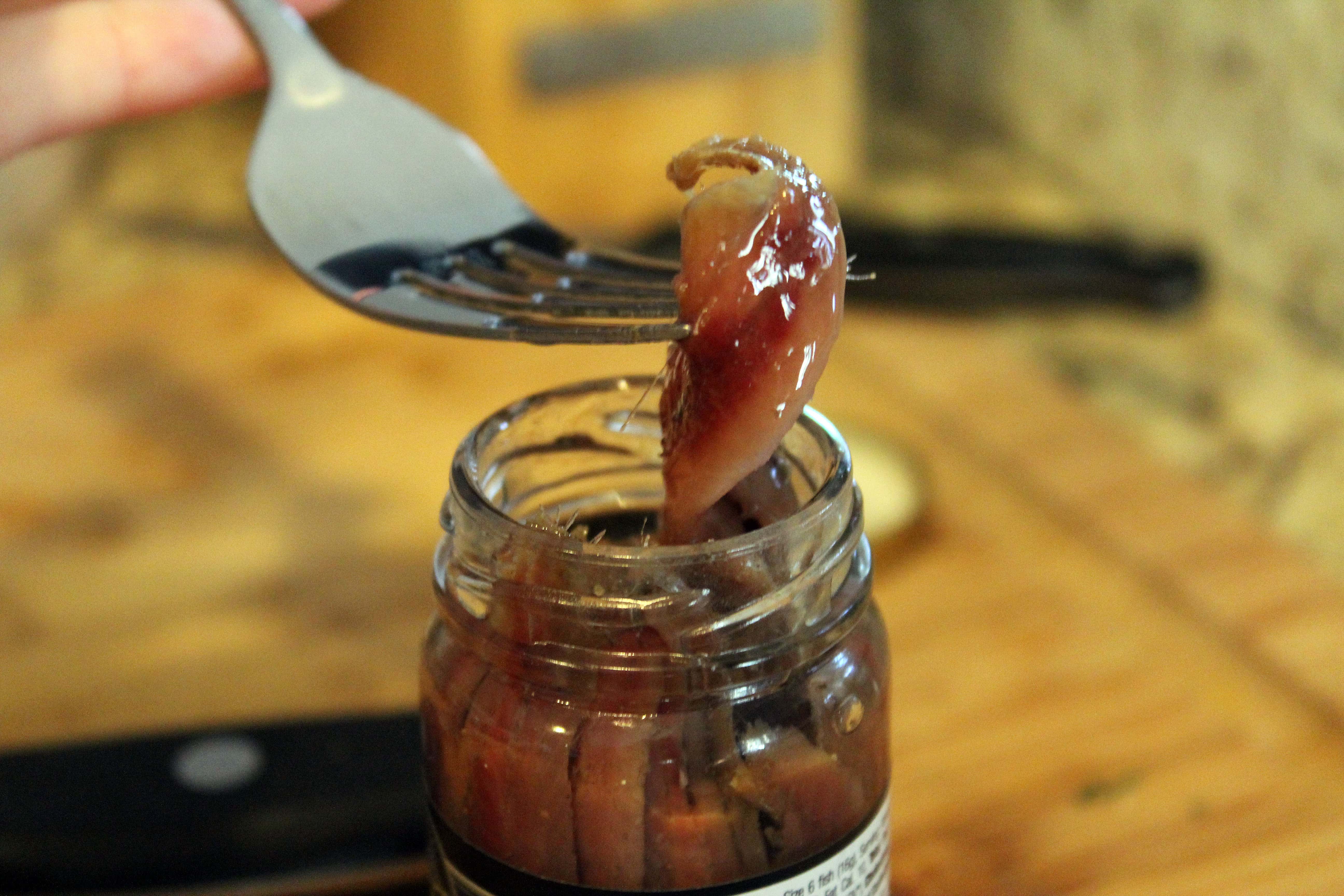 Remove anchovies from jar