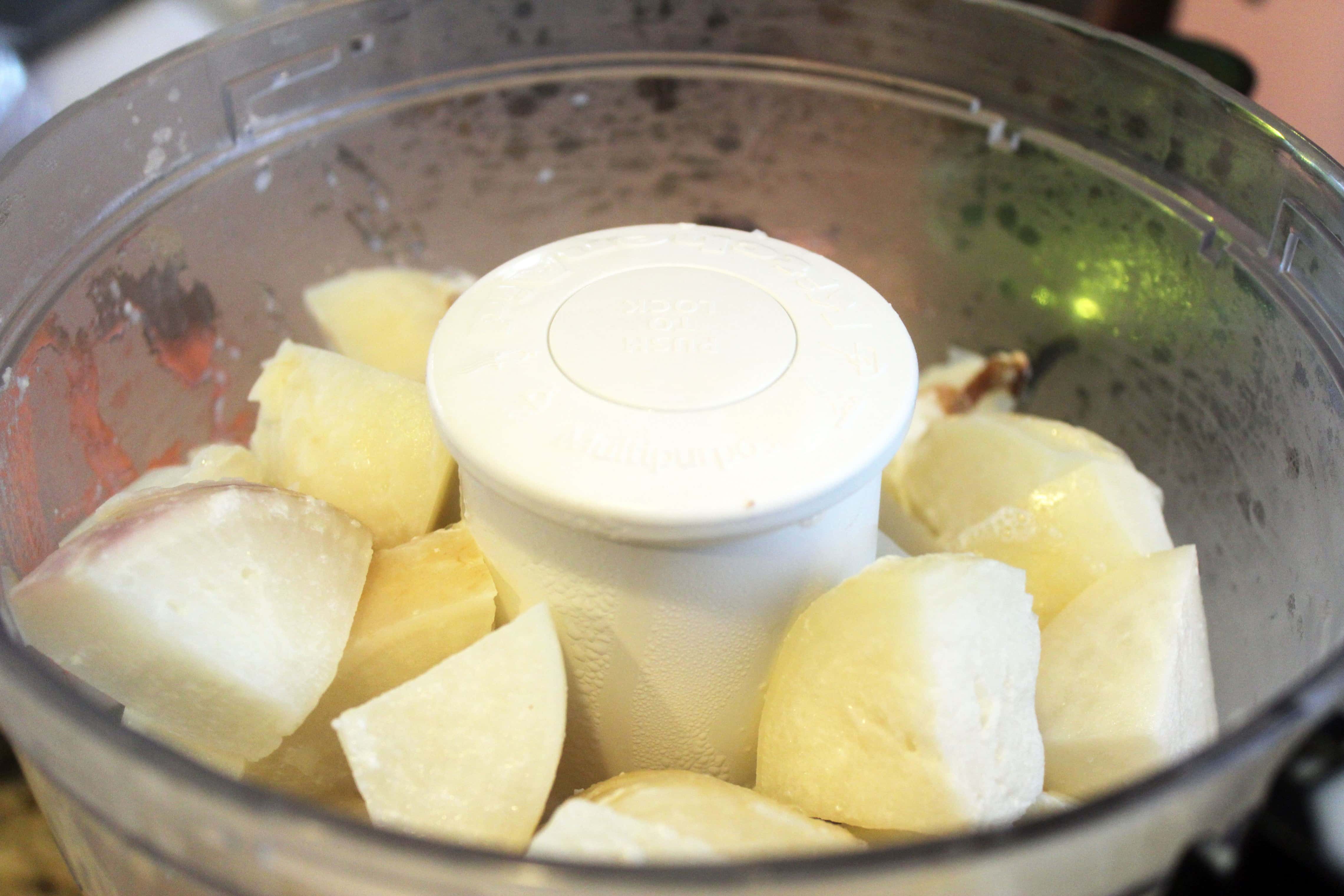 Add turnips to food processor
