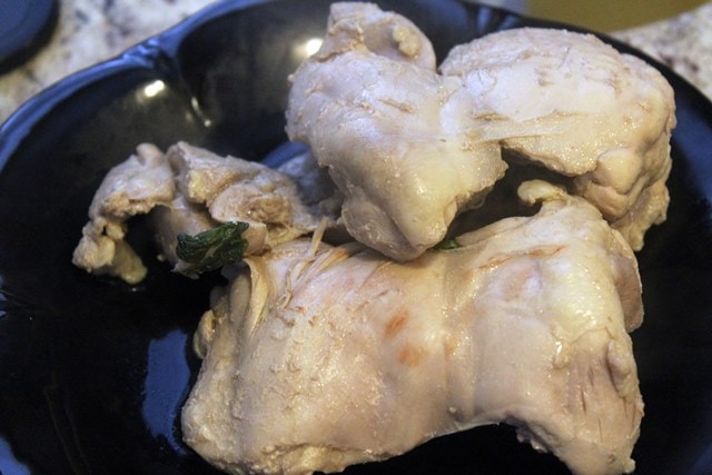 Let poached chicken cool