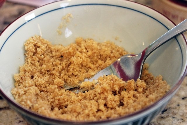 Mash butter and crumbs together