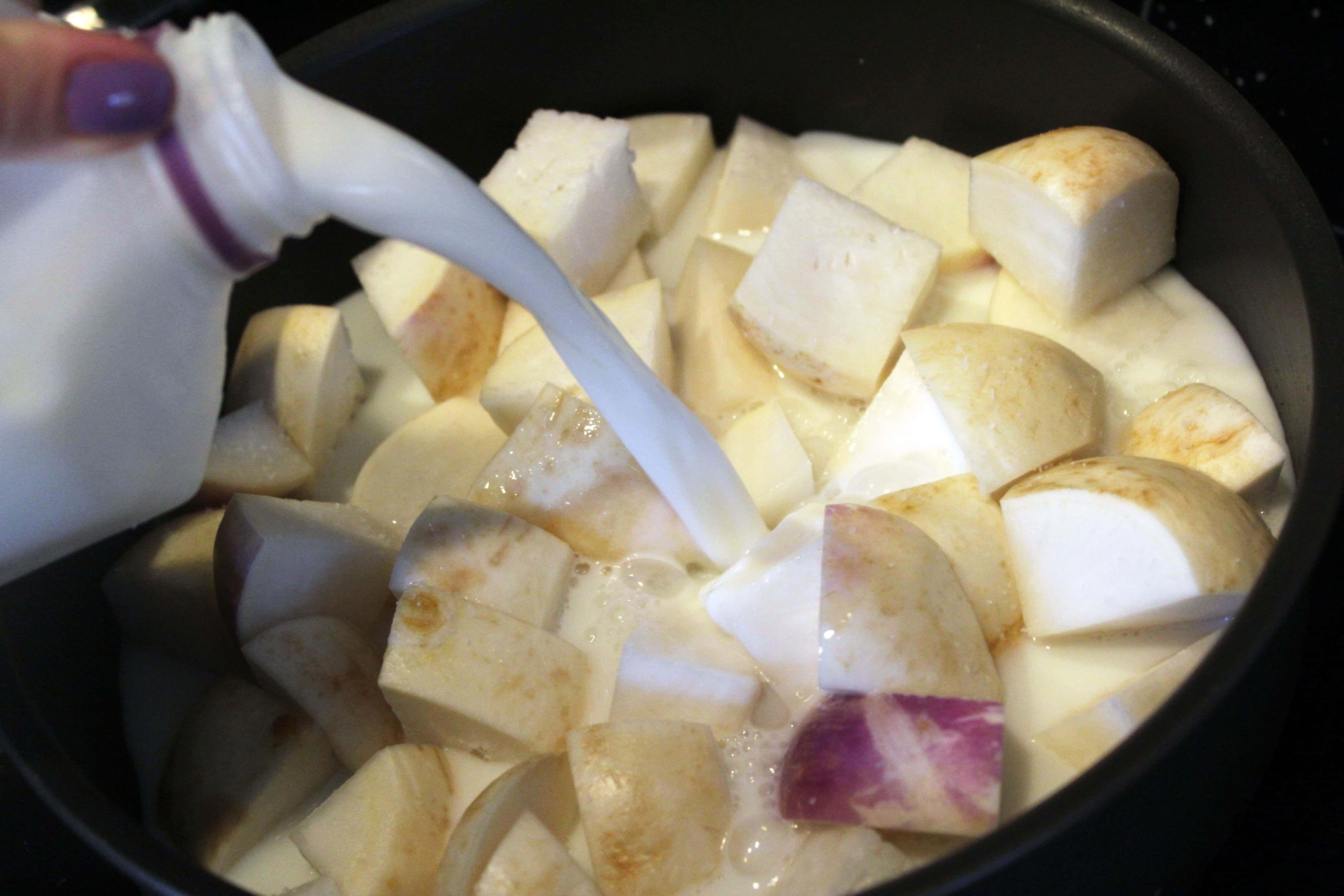 Pour milk over turnips