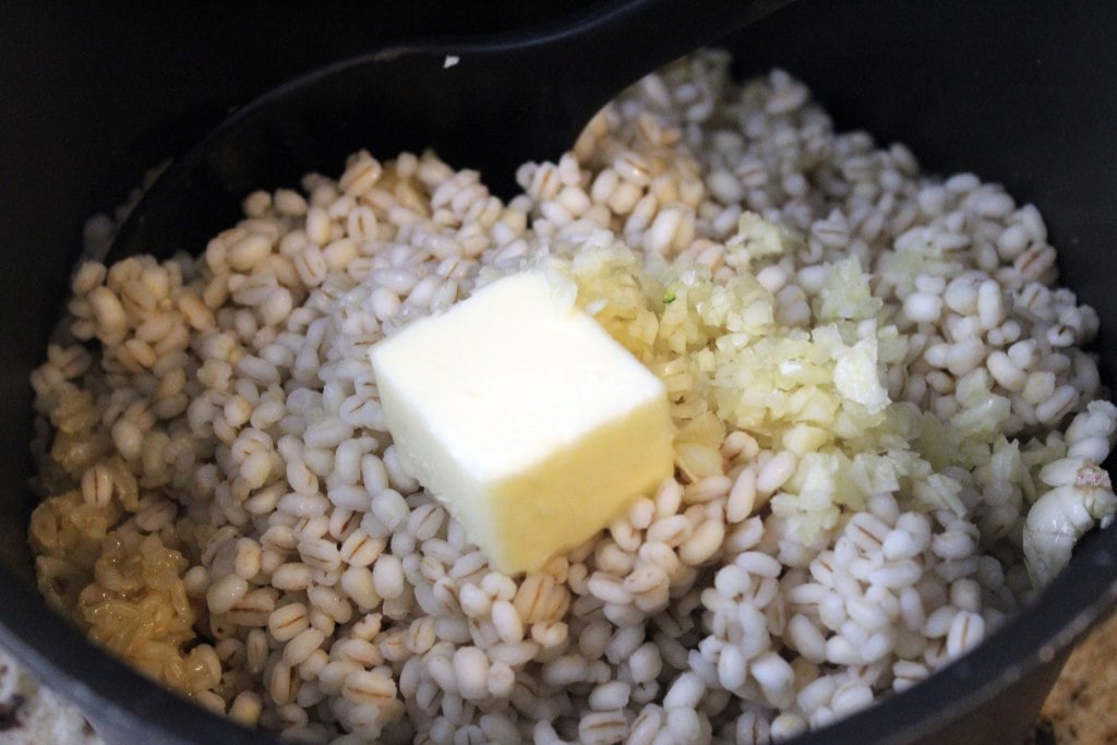 Add garlic and butter to grains