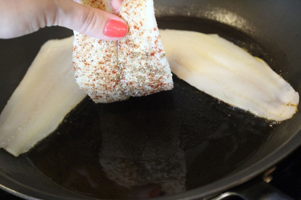 Place fish gently in pan