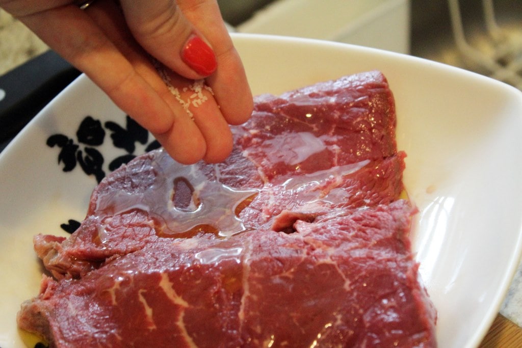 Sprinkle steak with olive oil