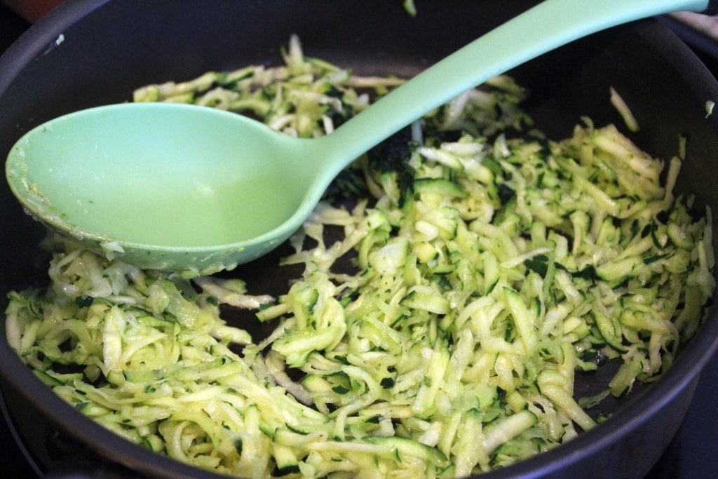 Stir zucchini to soften