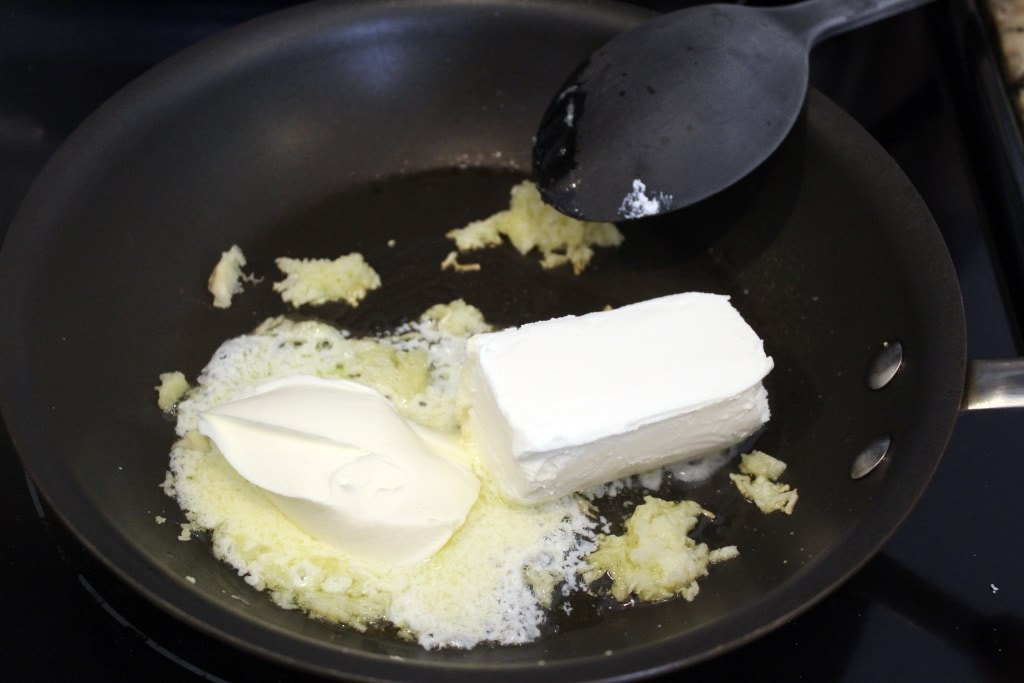Add cheeses to garlic