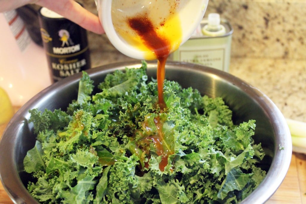Add dressing to chopped kale