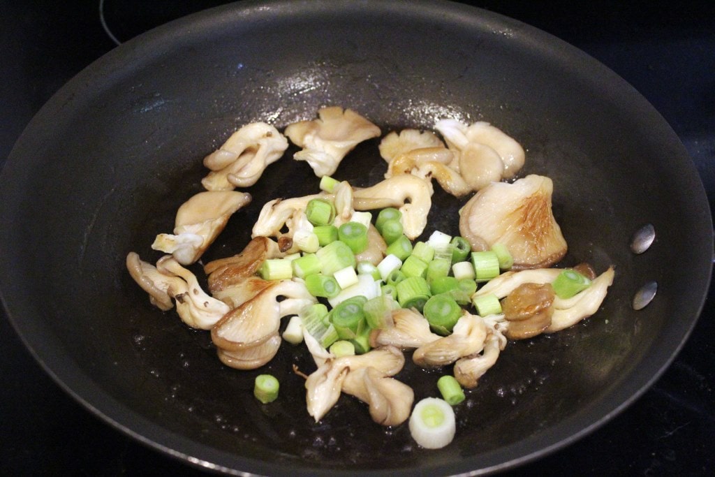 Add whites to toasted mushrooms