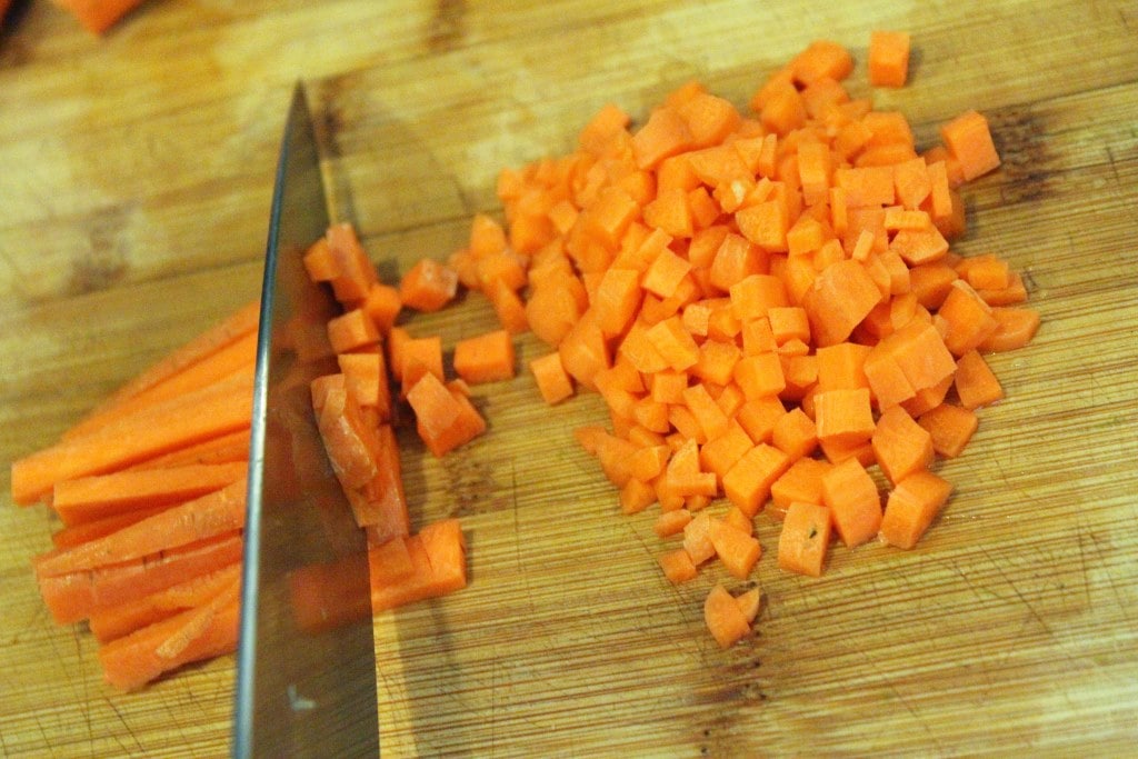 Chop carrots finely