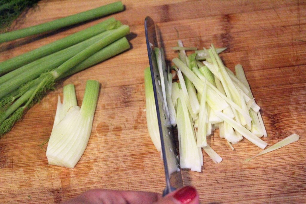 Thinly slice fennel