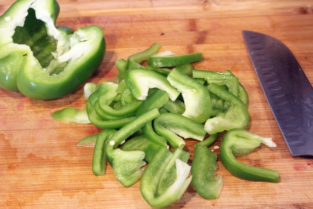 Thinly slice green peppers