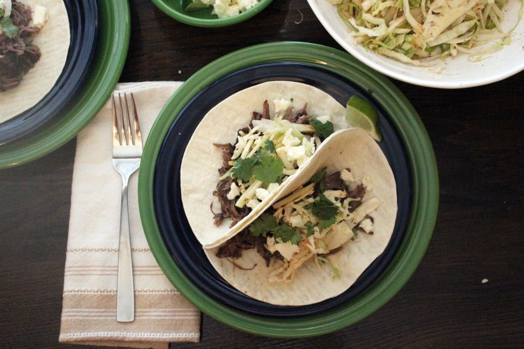 Two plated tacos