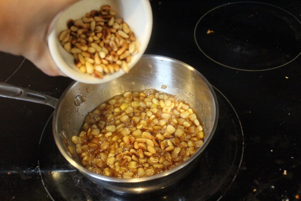 Add pine nuts to sauce to finish