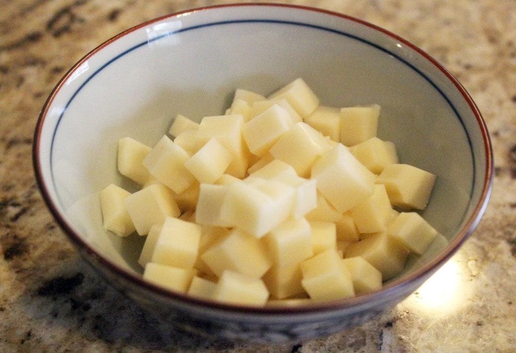 Cut cheese into little cubes