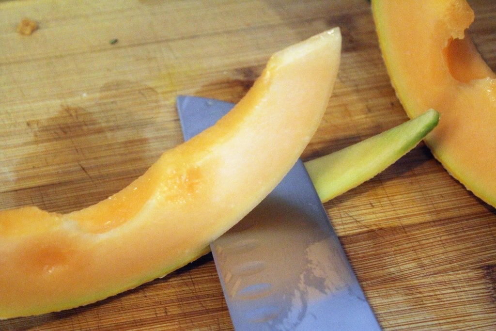 Remove skin from cantaloupe