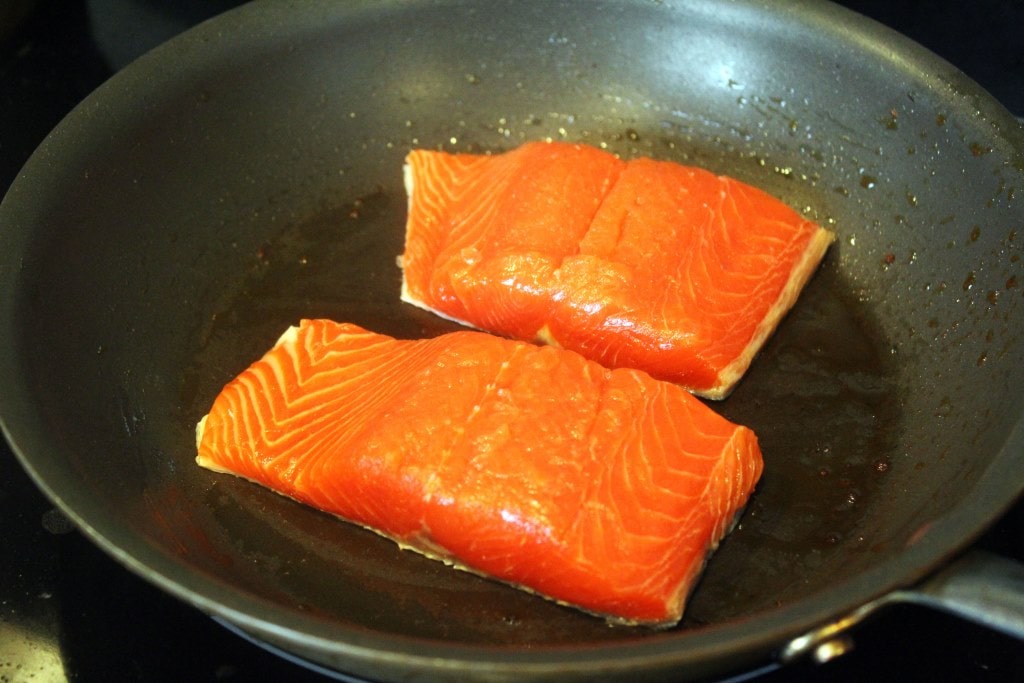 Start salmon skin-side down
