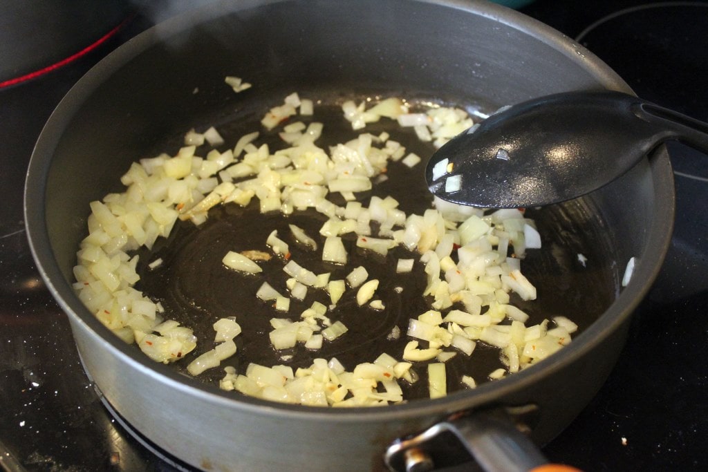 Stir garlic into onions