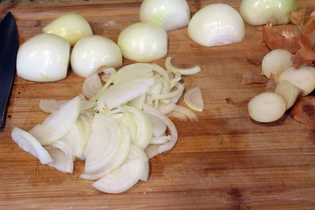 Thinly slice onions