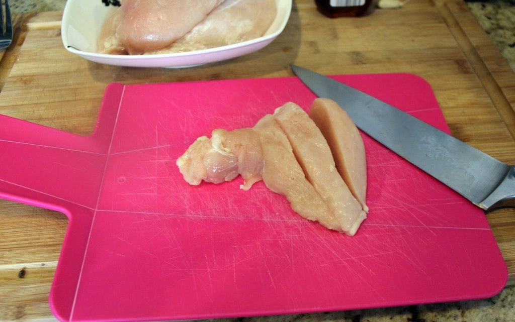 Cut chicken into strips