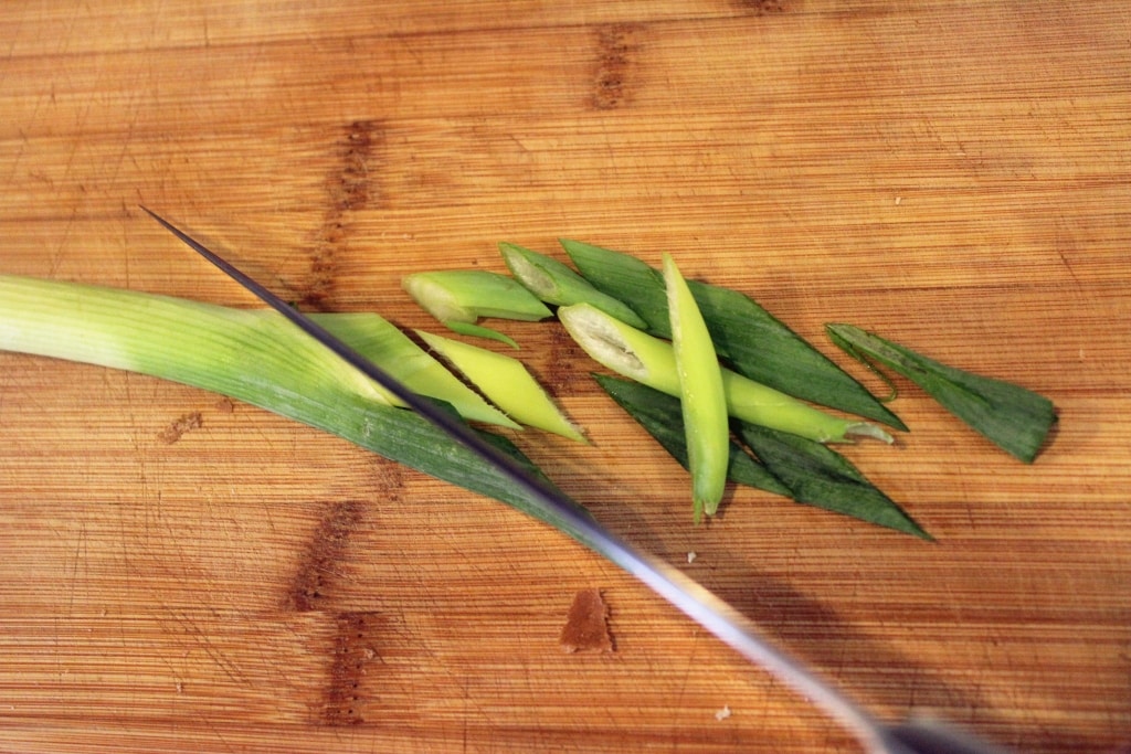 Thinly slice green onions