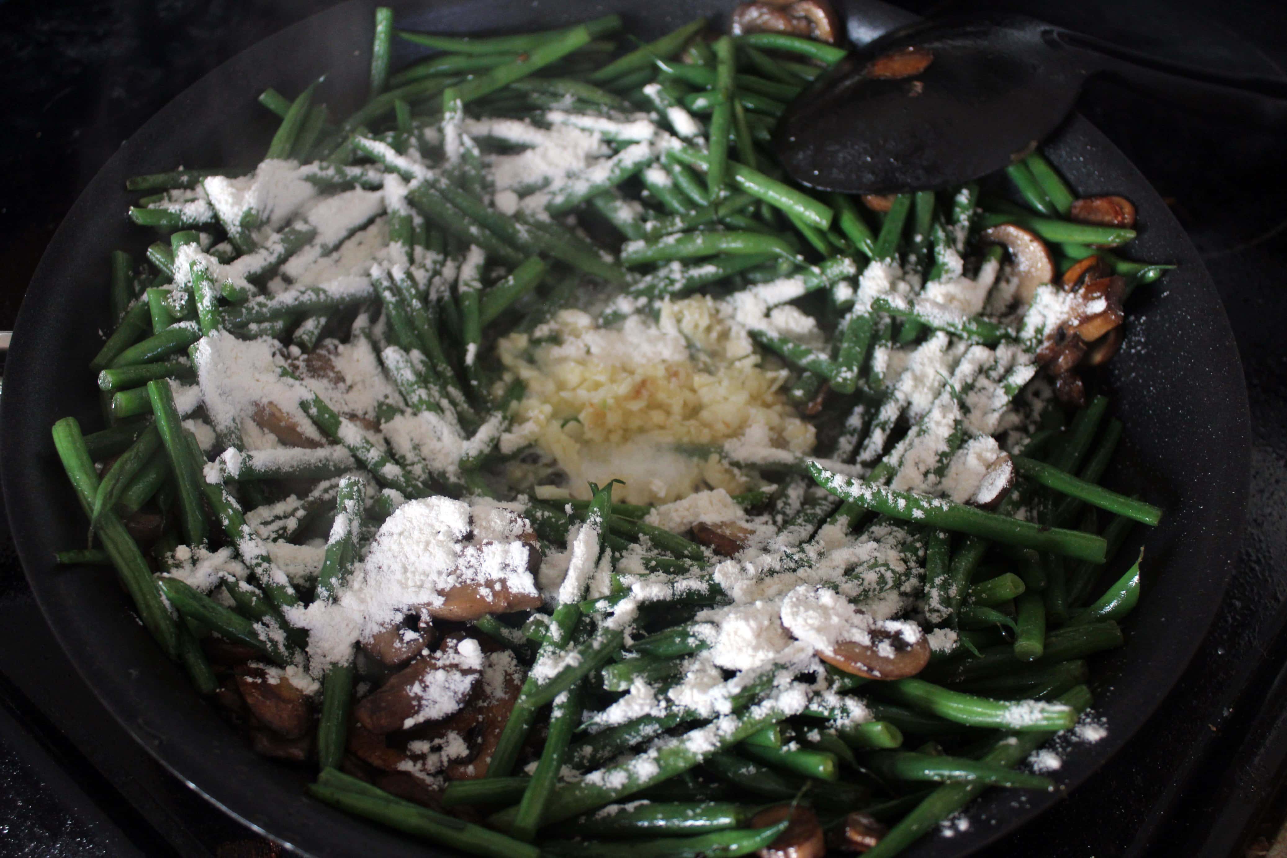 flour sprinkled over green beans and mushrooms as a roux.