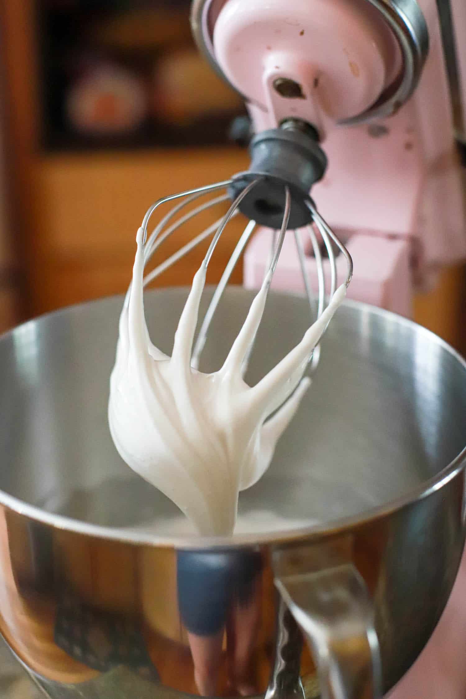 Beaten egg whites on stand mixer whisk.