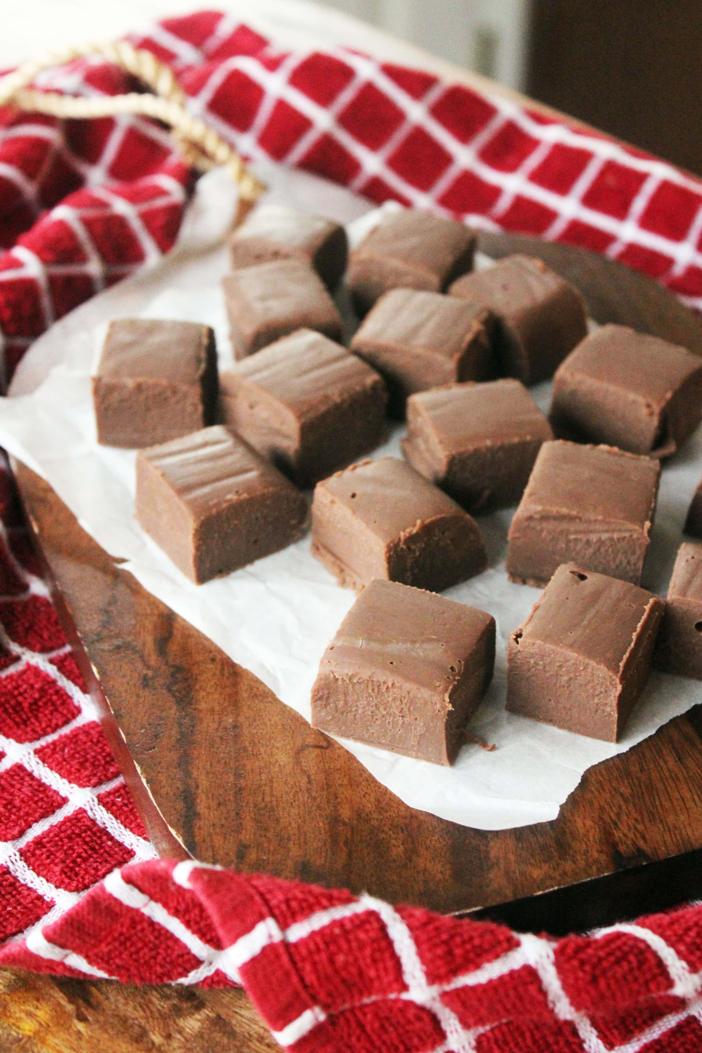 small cubes of peppermint patty fudge with red checkered napkin.