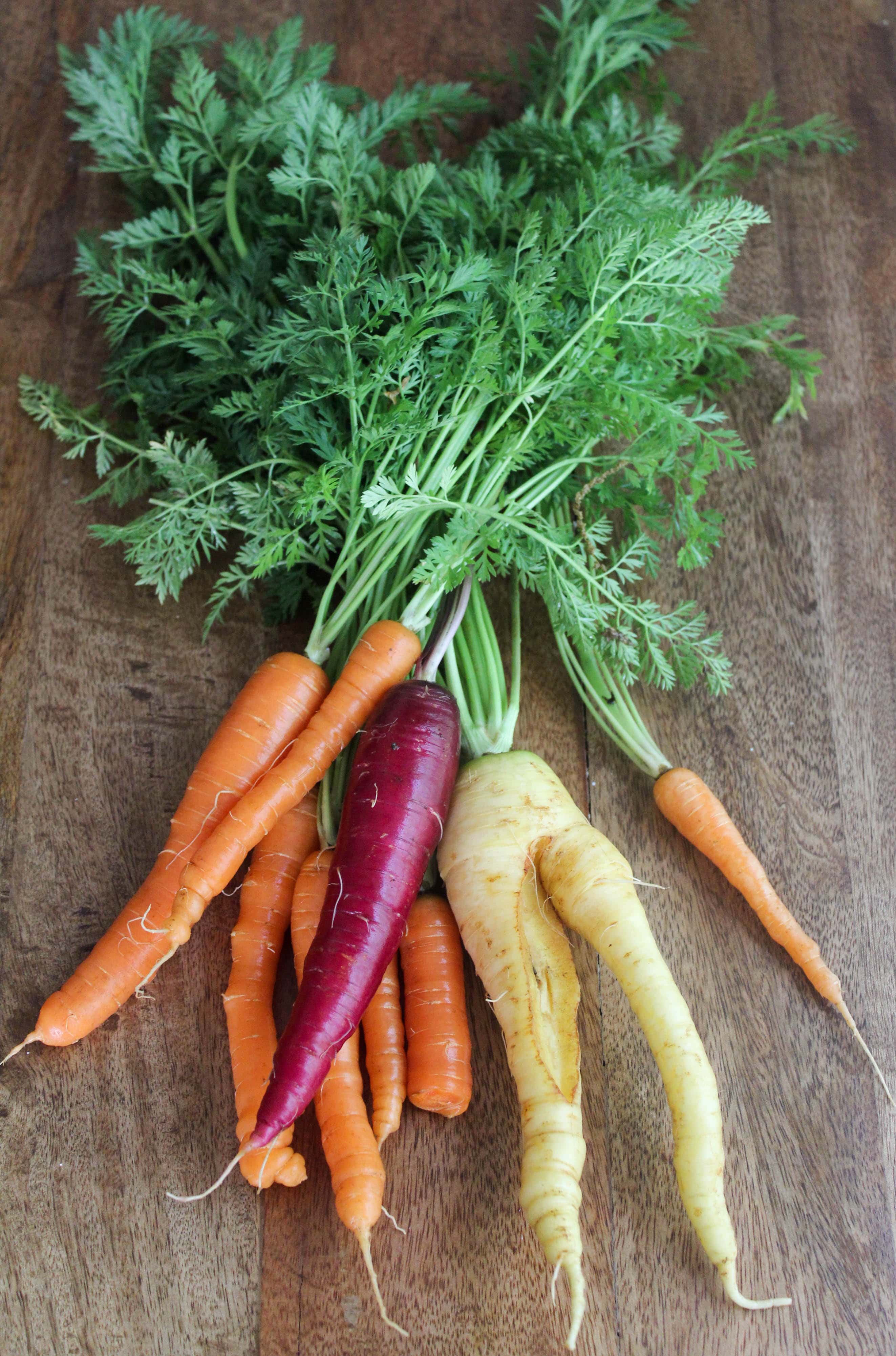 whole carrots with green tops