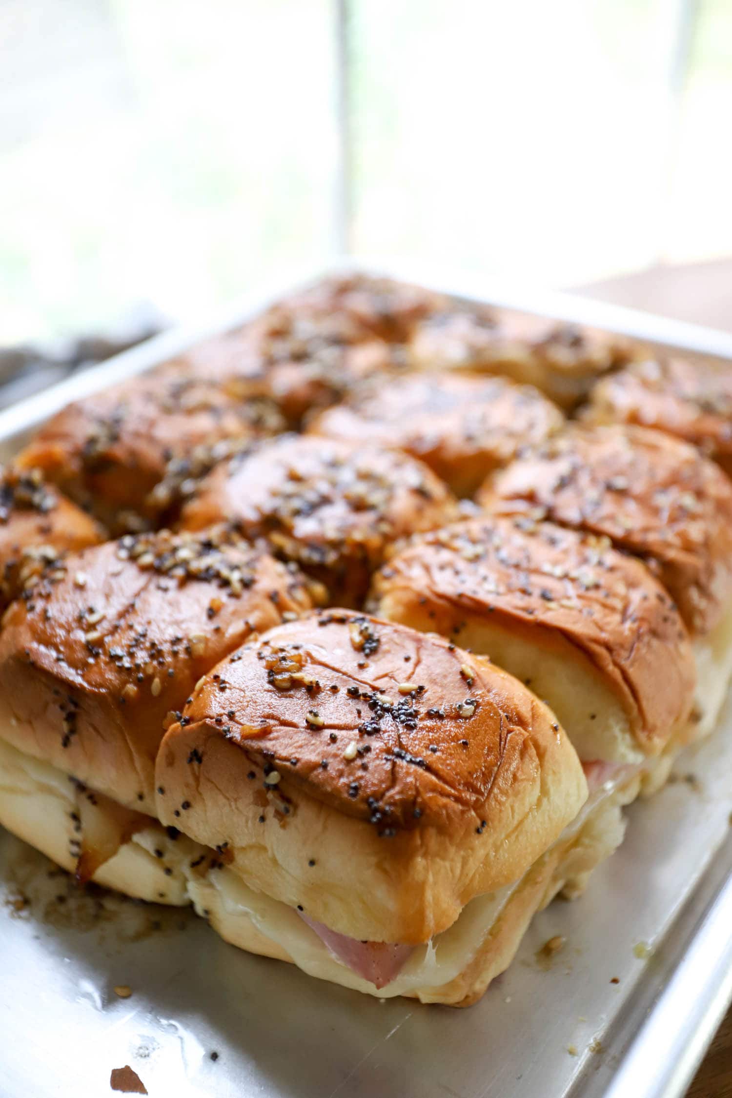 side view of ham delights on a silver tray.