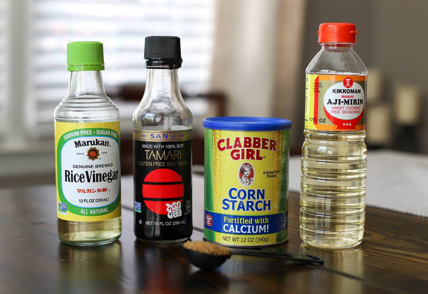 Bottles of ingredients for homemade poke sauce.