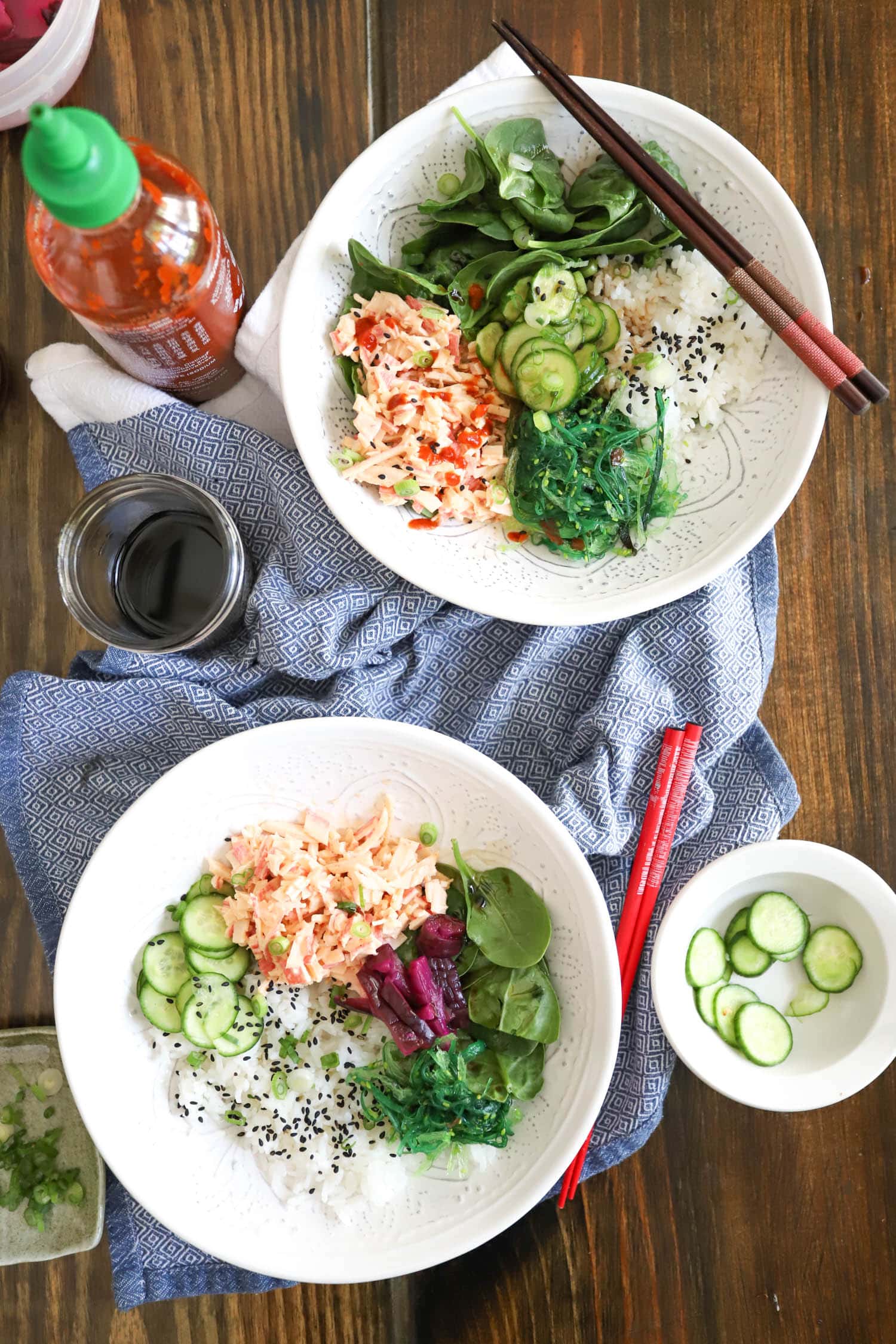table with crab salad poke bowls.