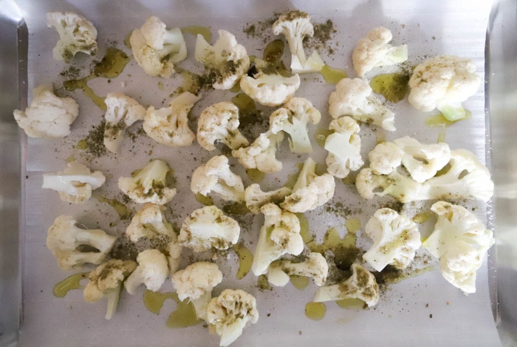 cauliflower raw on baking sheet